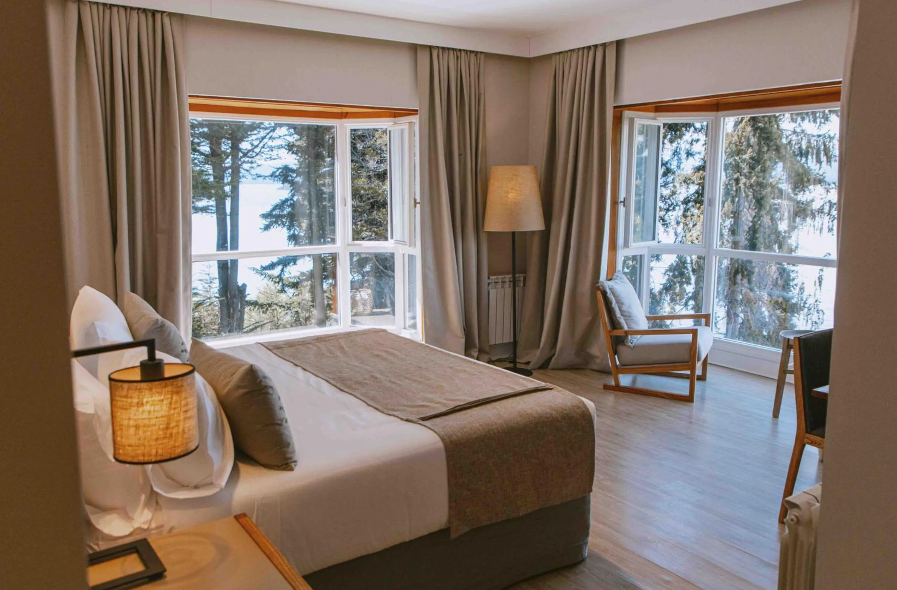 Bed in La Cascada Casa Patagónica by DON