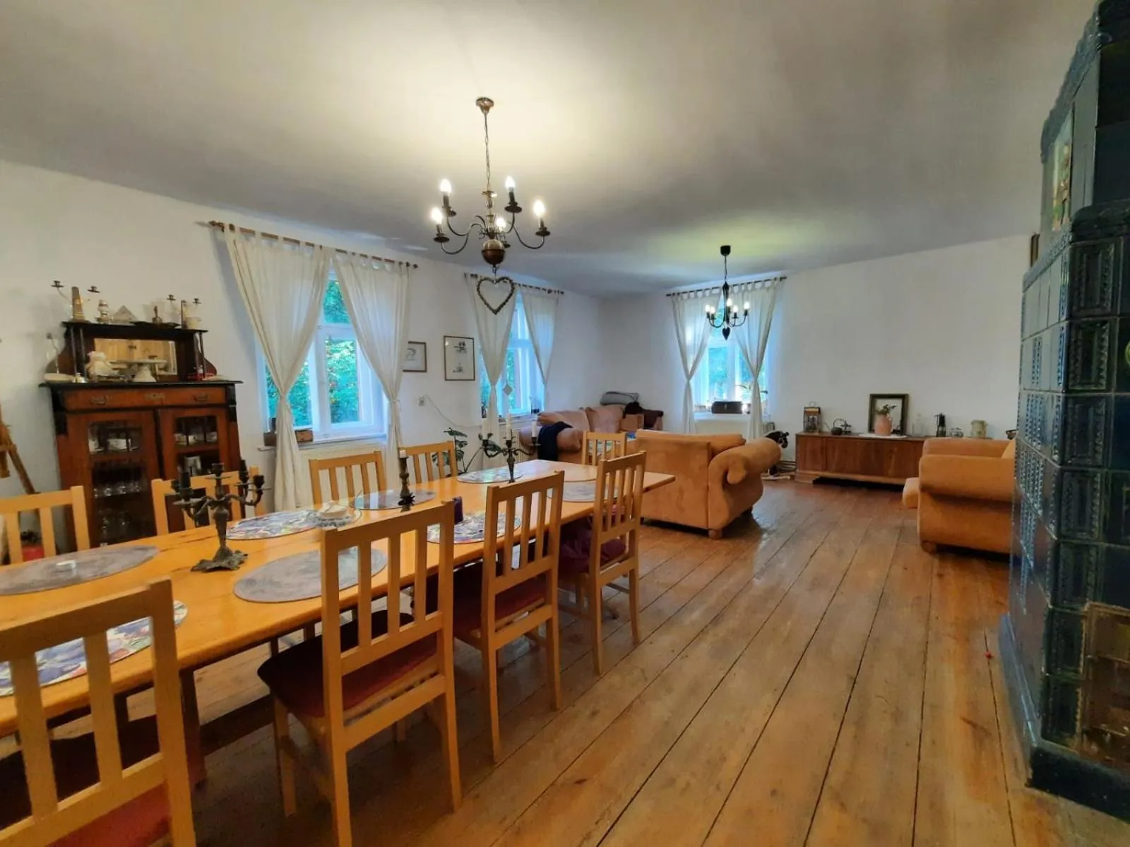 Communal lounge/ TV room in Dom na Mazurach Pilec