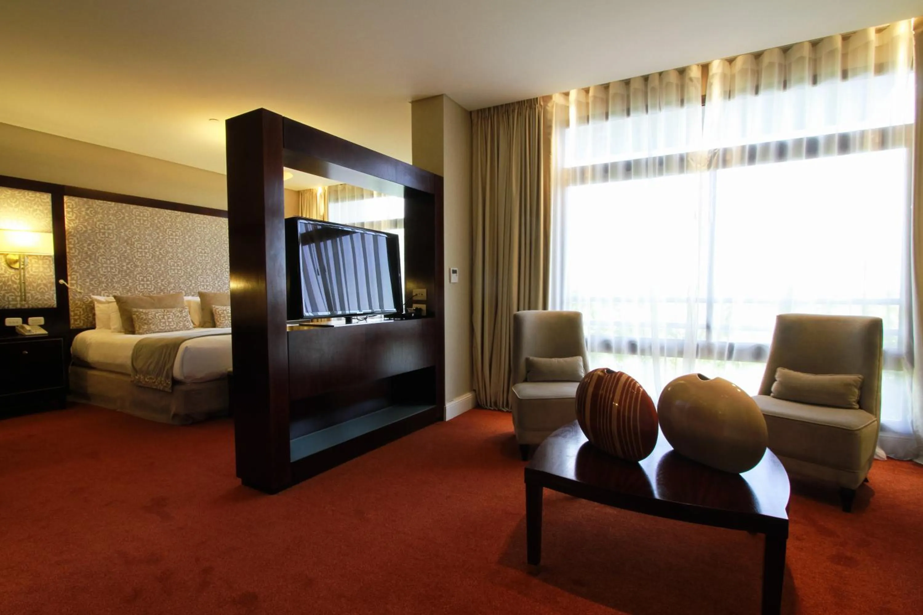 Living room, Bed in Iguazú Grand Resort Spa & Casino