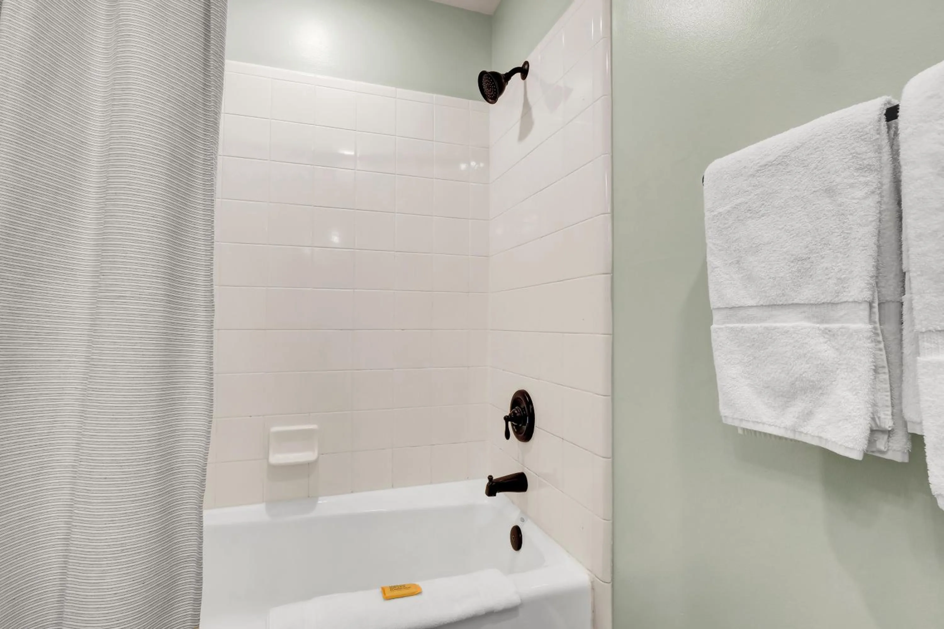 Shower in Sandpeddler Inn and Suites