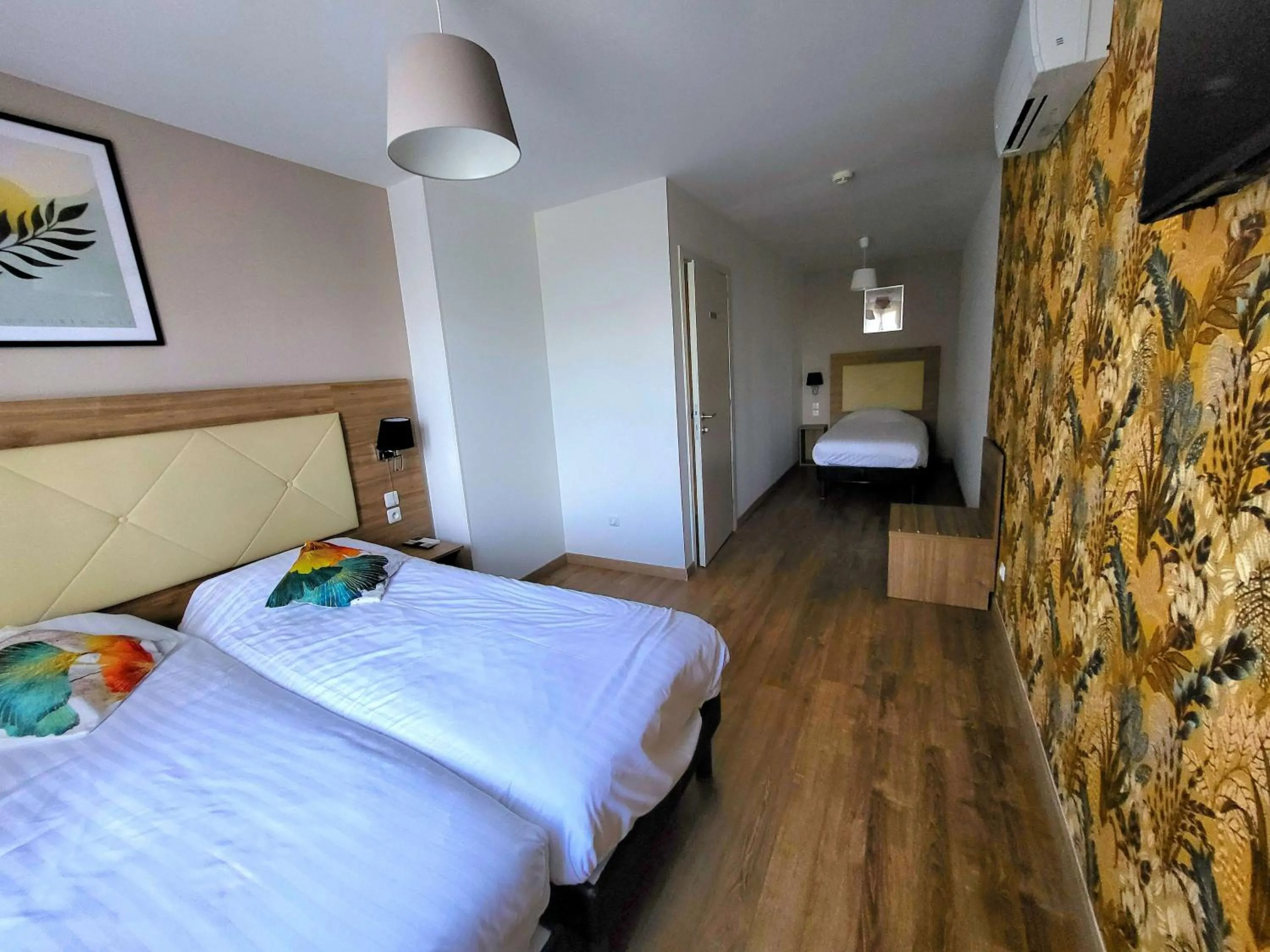 Bed in Le Grand Hôtel Molière