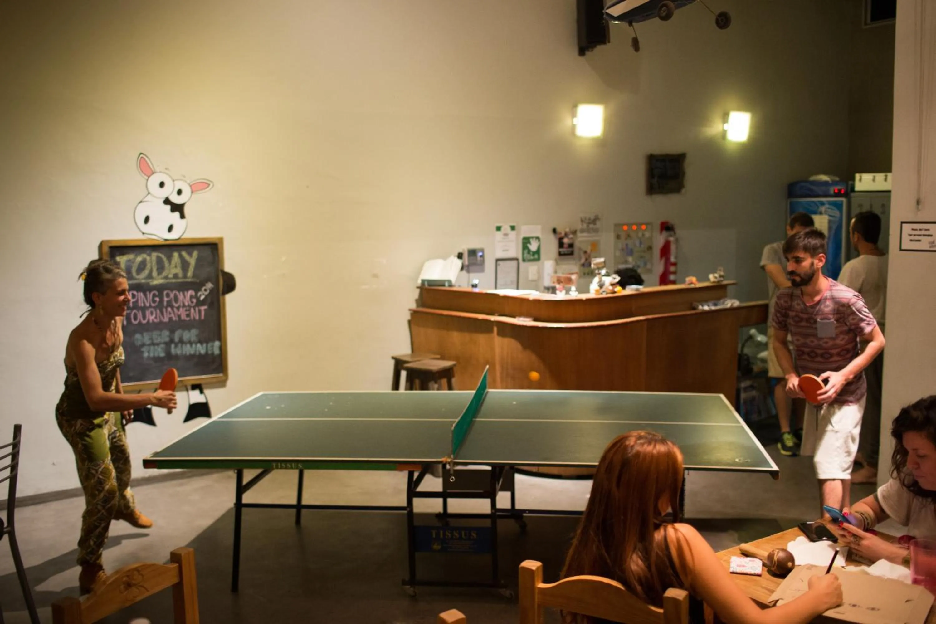 Communal lounge/ TV room in Sabatico Travelers Hostel & Guesthouse