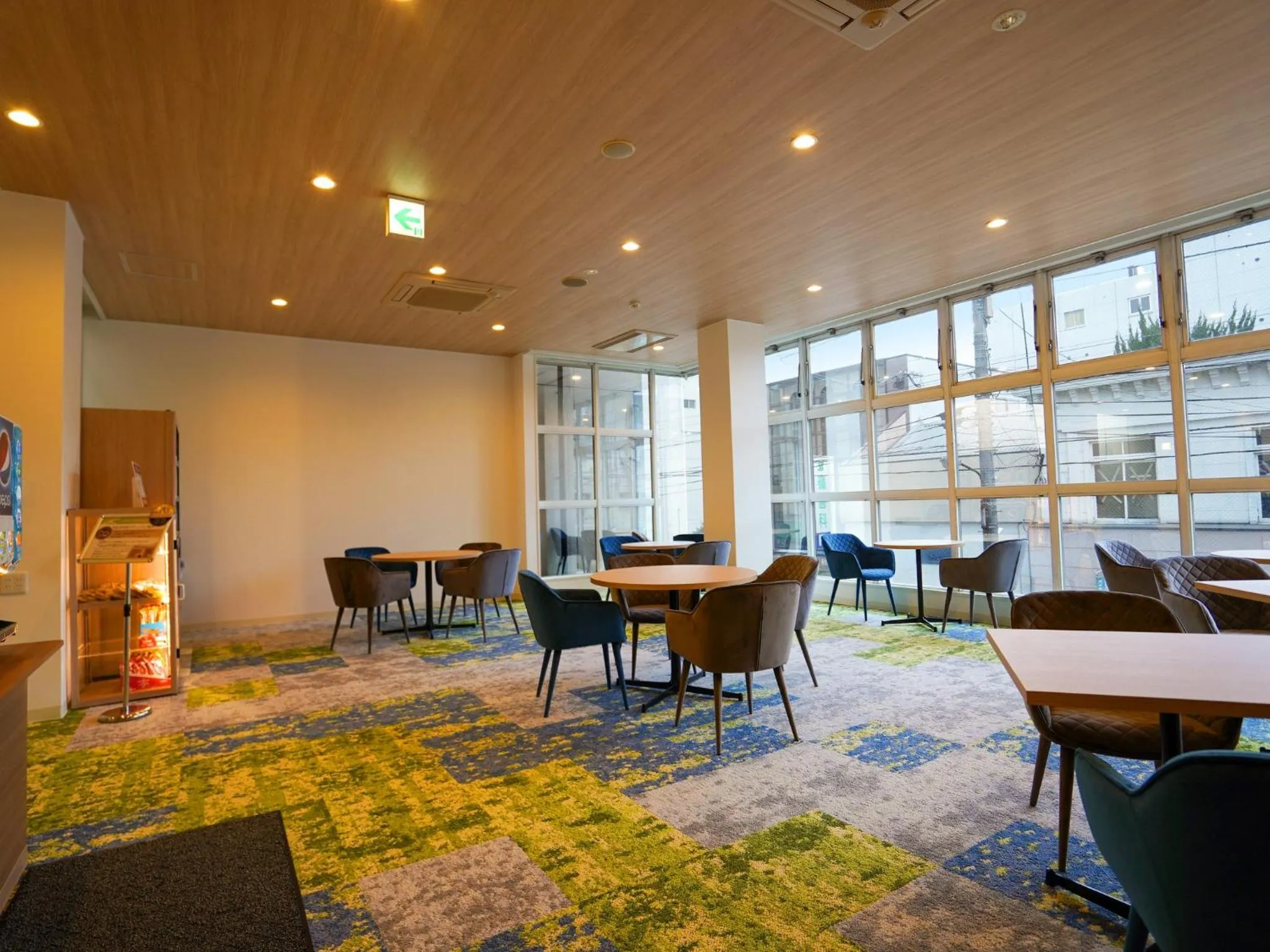 Communal lounge/ TV room in Hotel New Gaea Iizuka