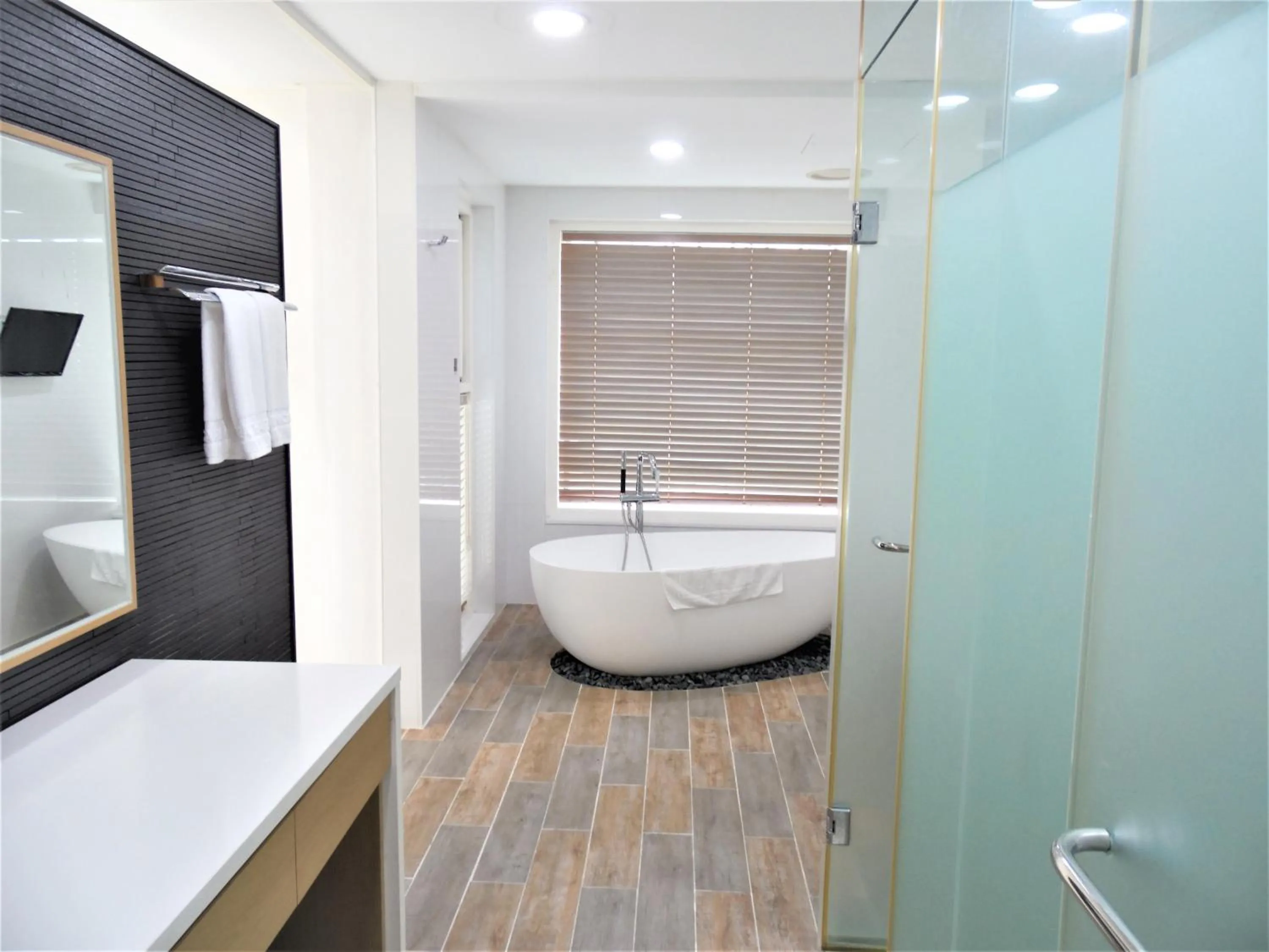 Shower, Bed in Healthcare Town Resort