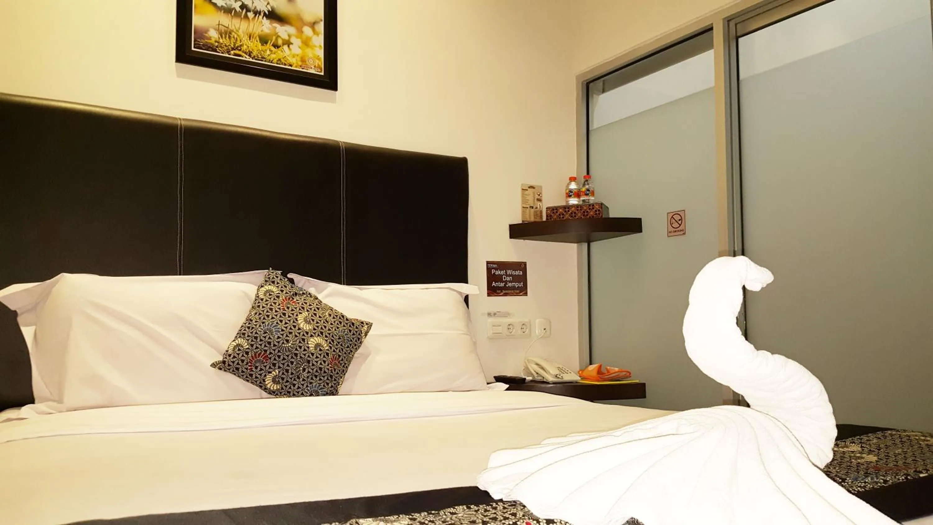 Bed in Sunrise Hotel Jombor Jogja