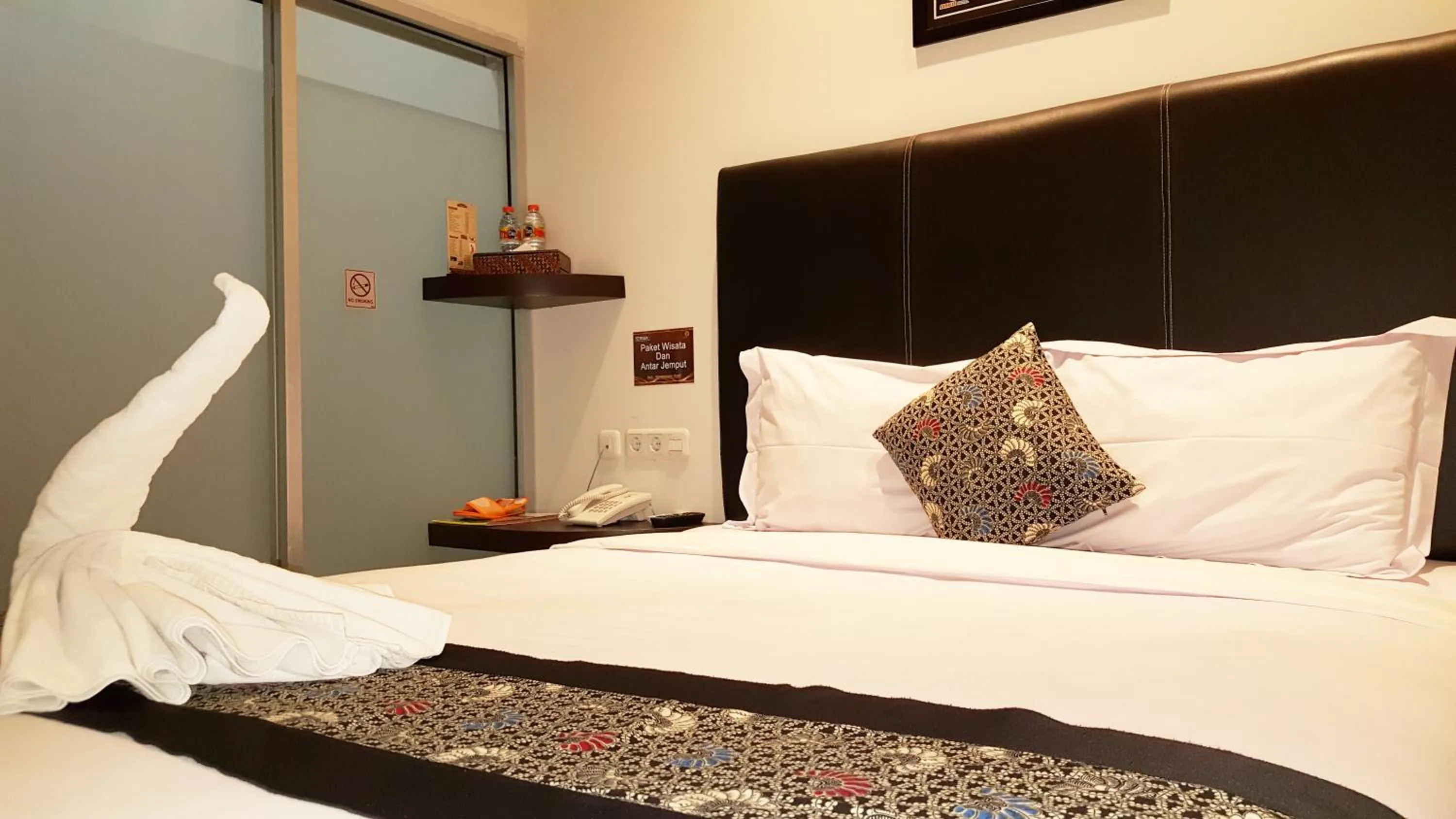 Bed in Sunrise Hotel Jombor Jogja