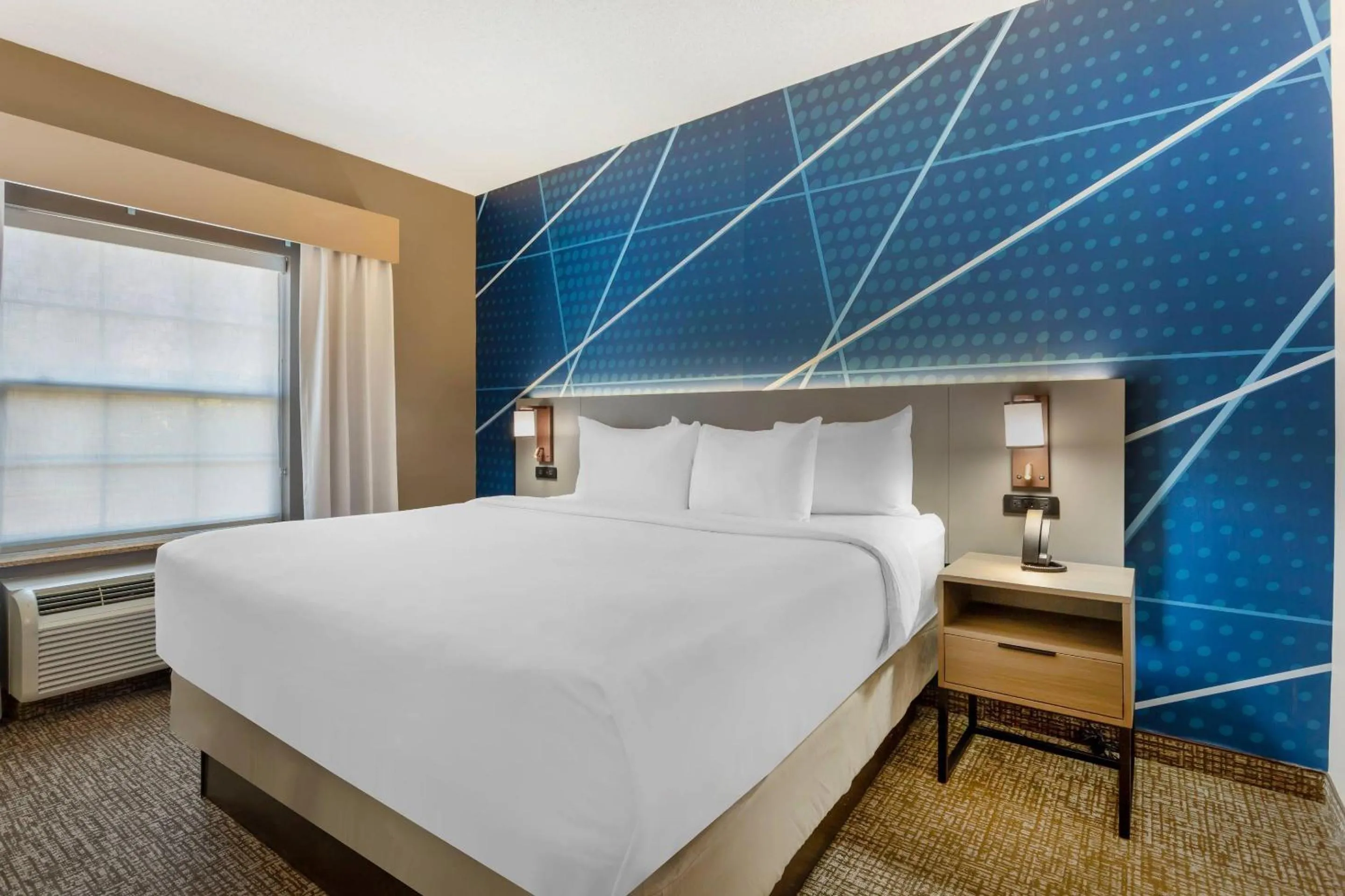 Bed in Comfort Suites East Brunswick - South River