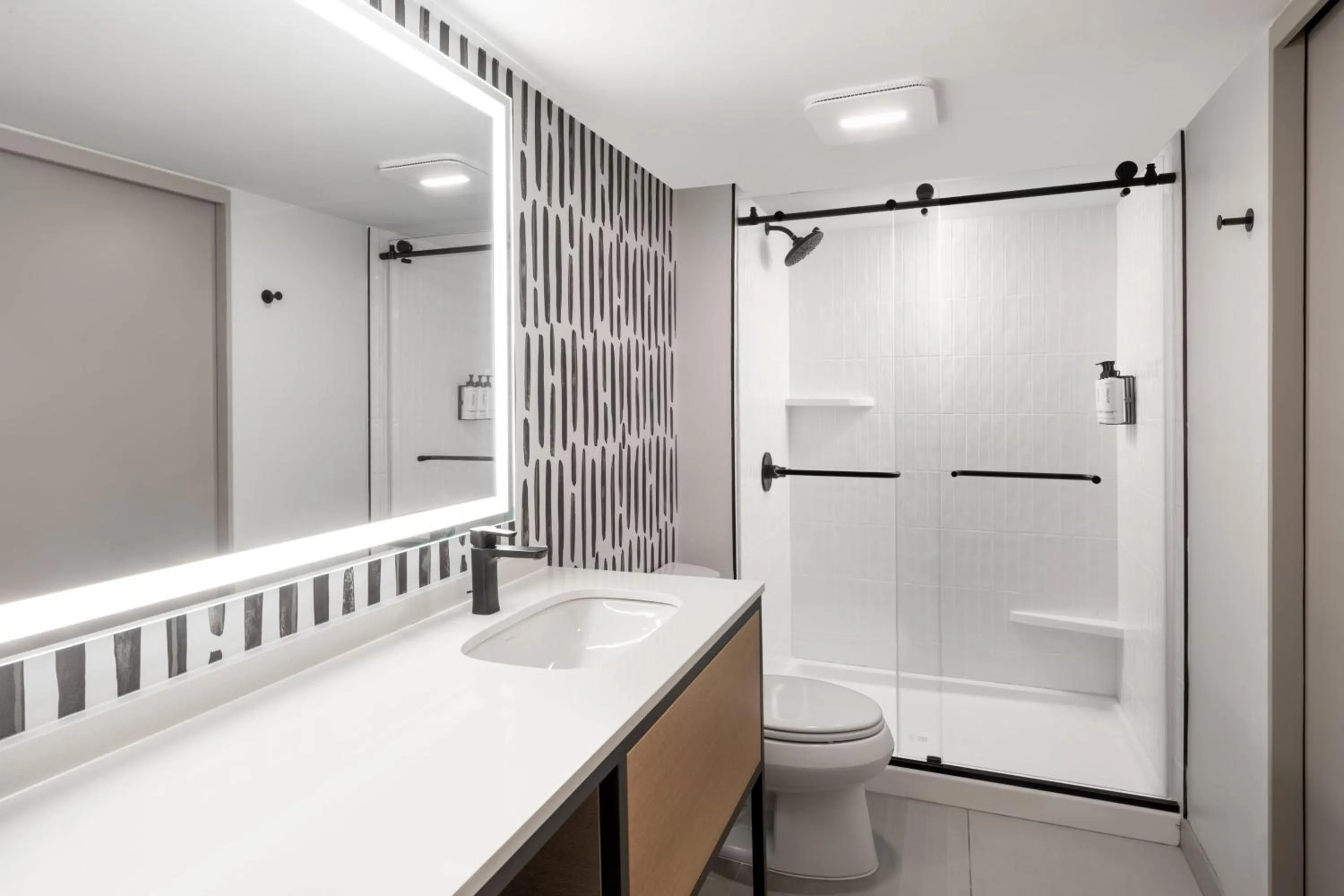 Bathroom in Atwell Suites Austin Airport by IHG