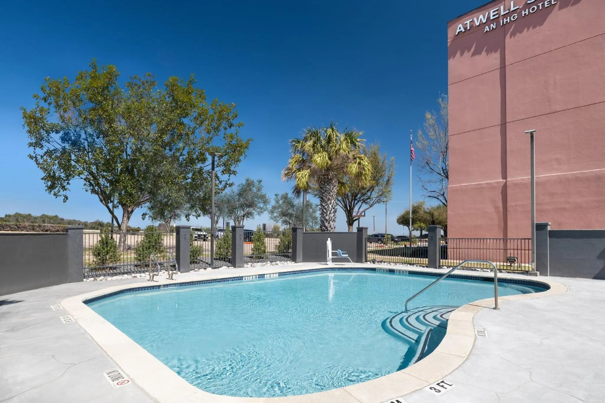 Swimming pool in Atwell Suites Austin Airport by IHG