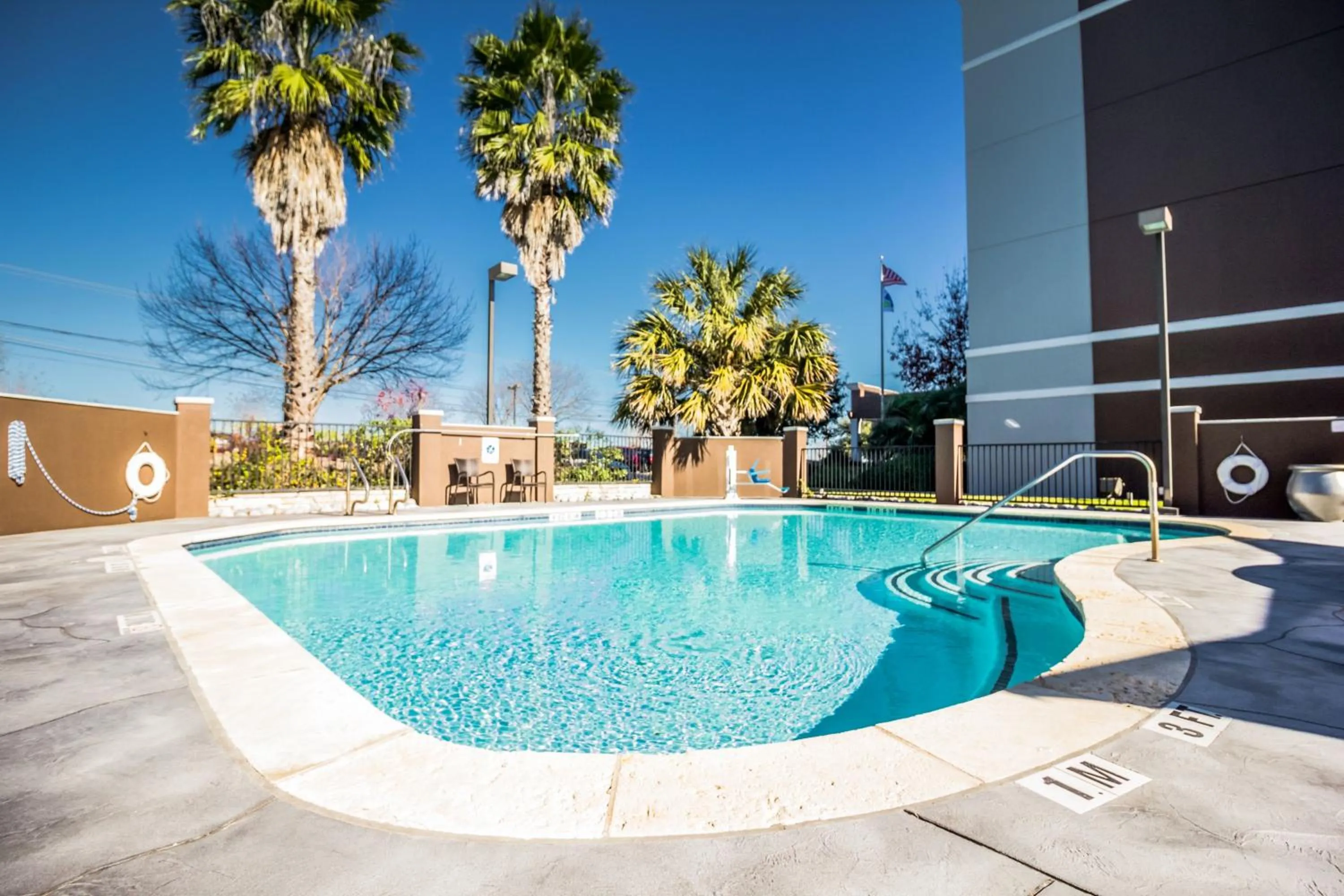 Swimming pool in Atwell Suites Austin Airport by IHG