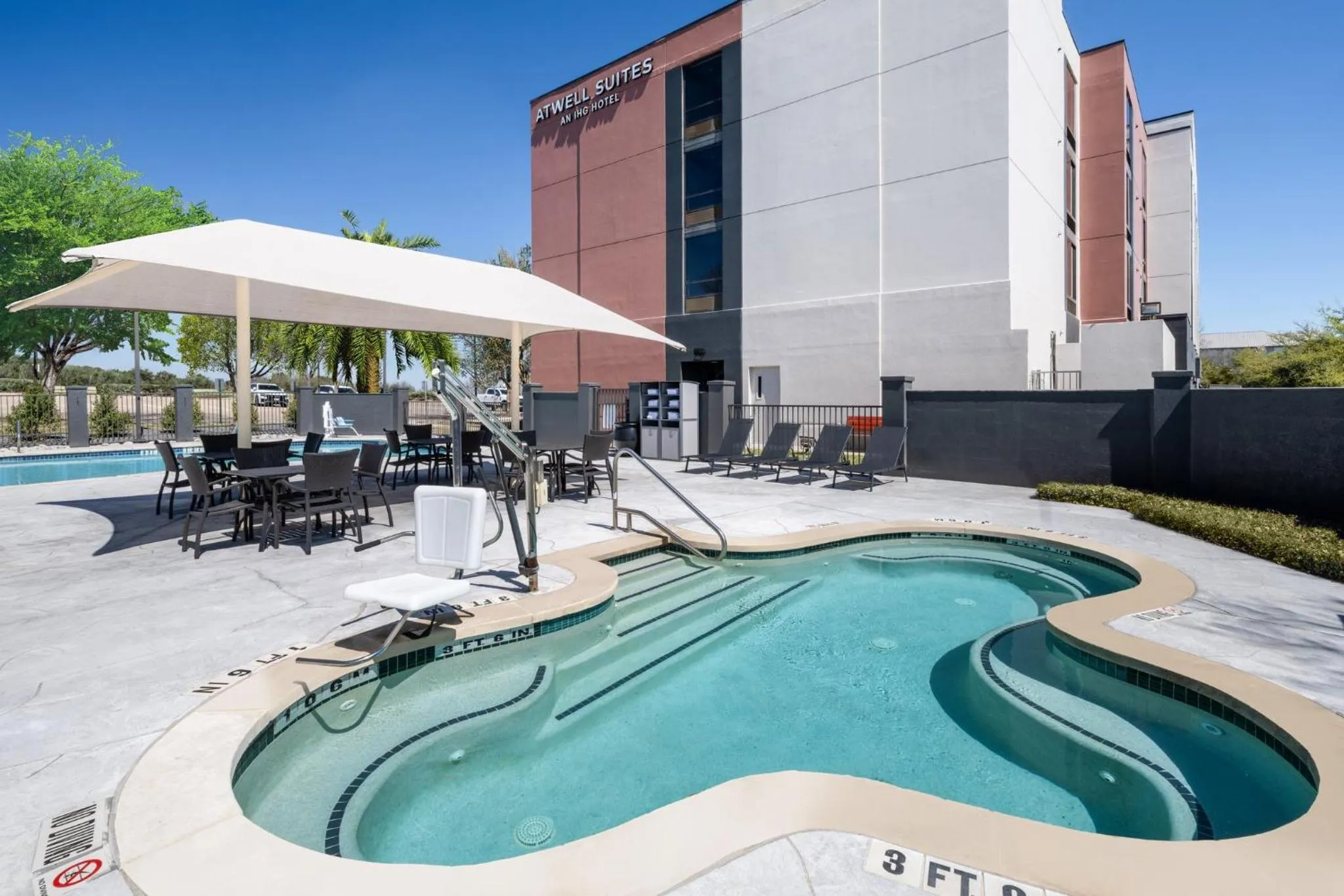 Swimming pool in Atwell Suites Austin Airport by IHG