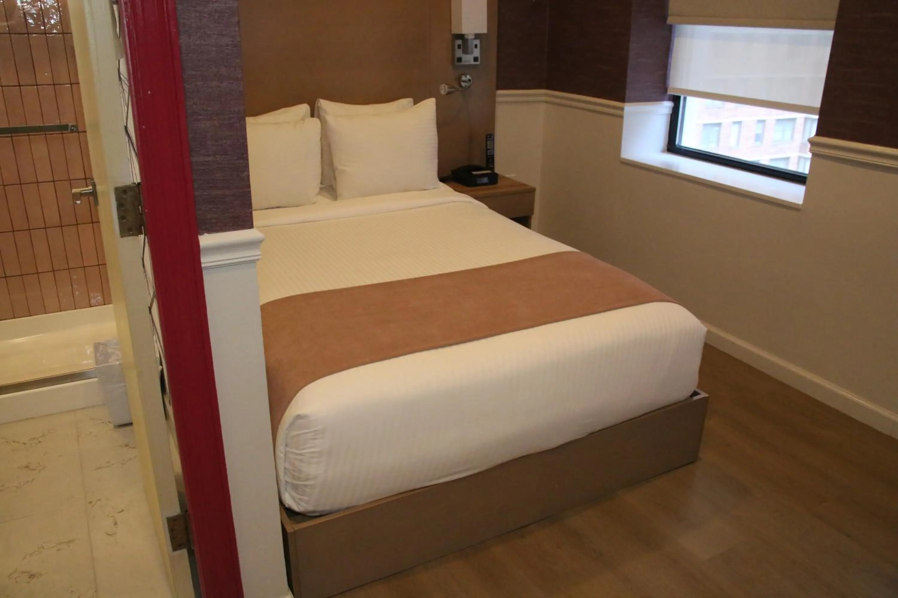 Bed in The Mayfair Hotel Times Square, Ascend Hotel Collection