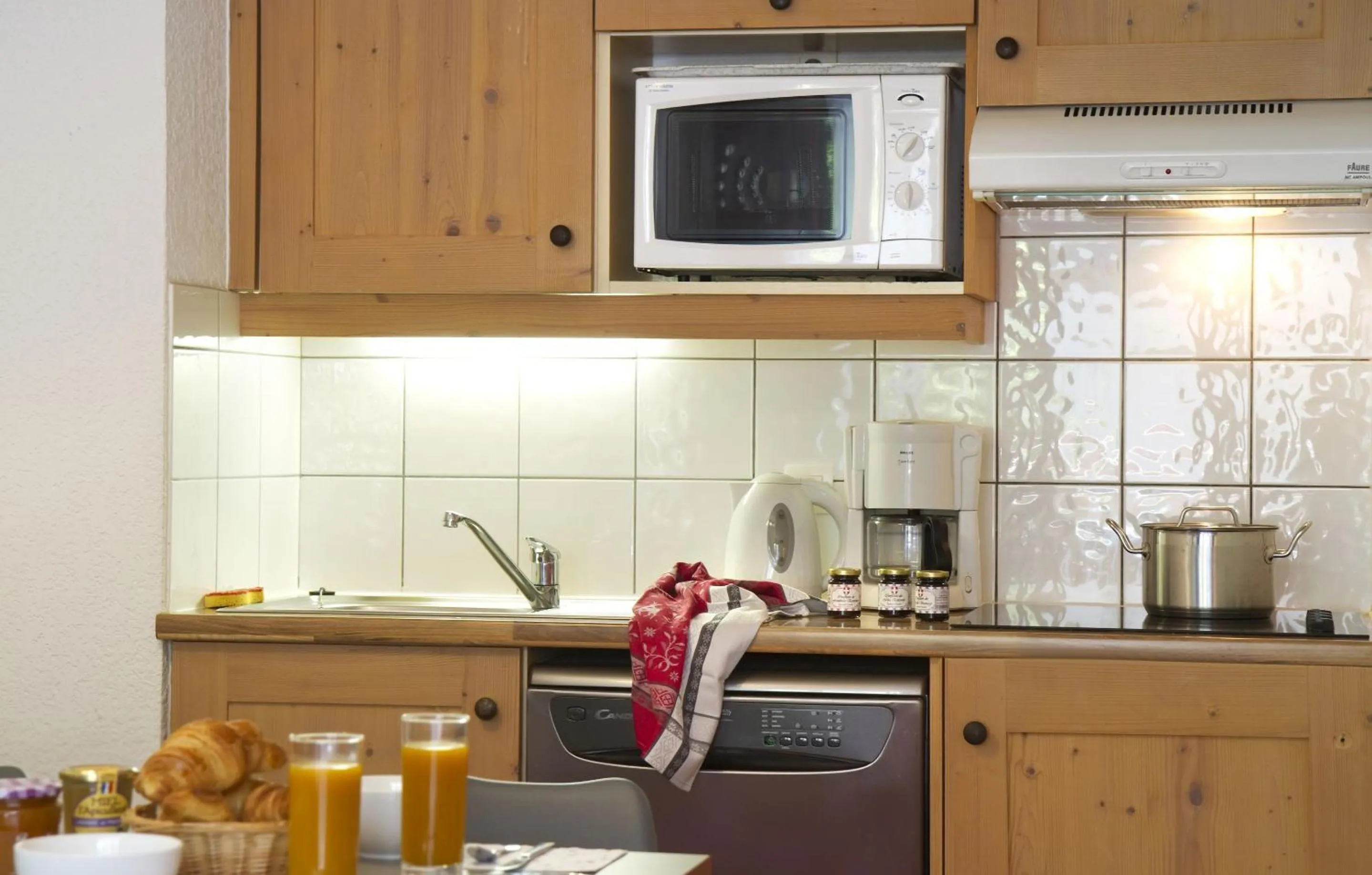 Kitchen or kitchenette in Résidence Odalys Le Village