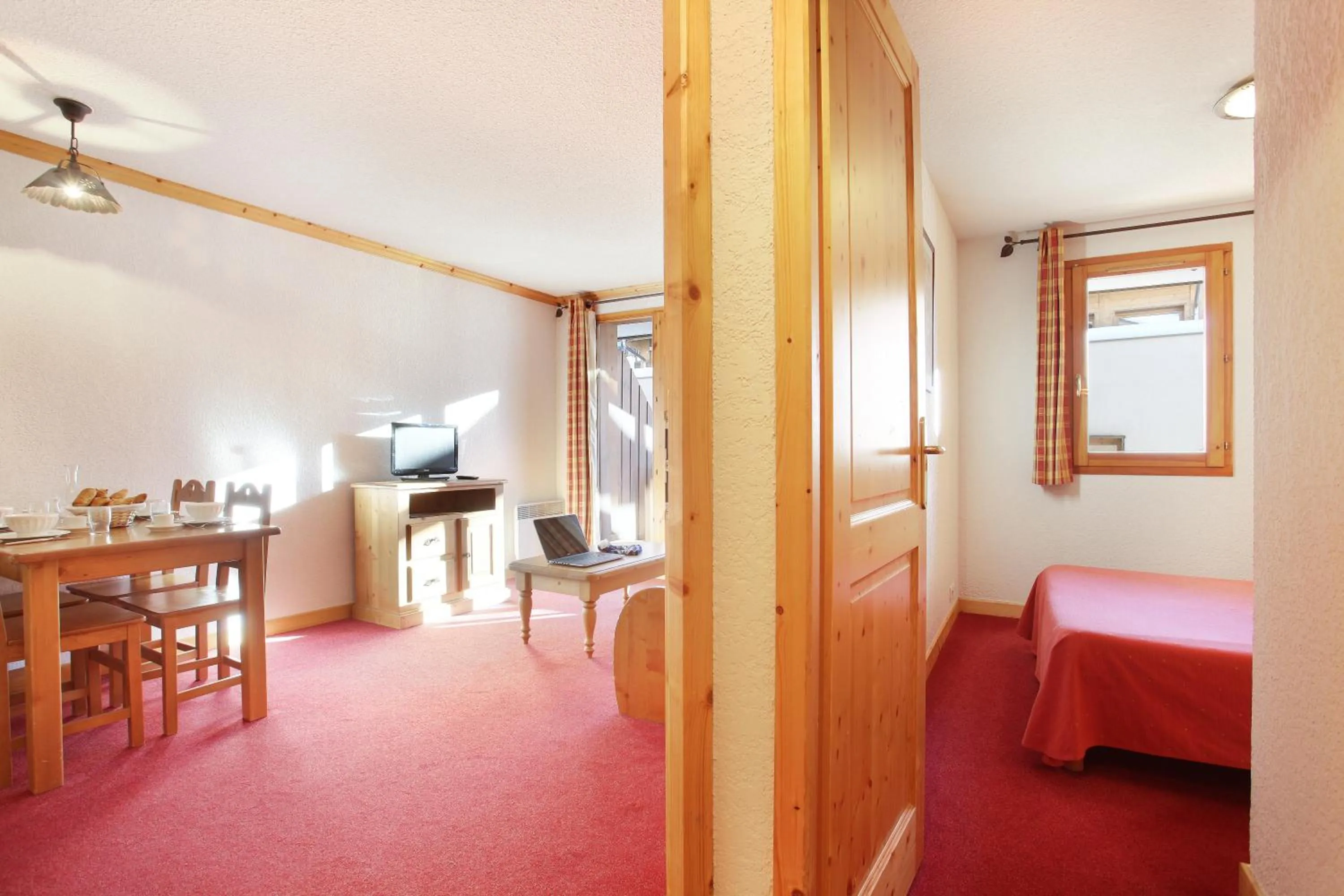 Seating area, Bed in Résidence Odalys Le Village