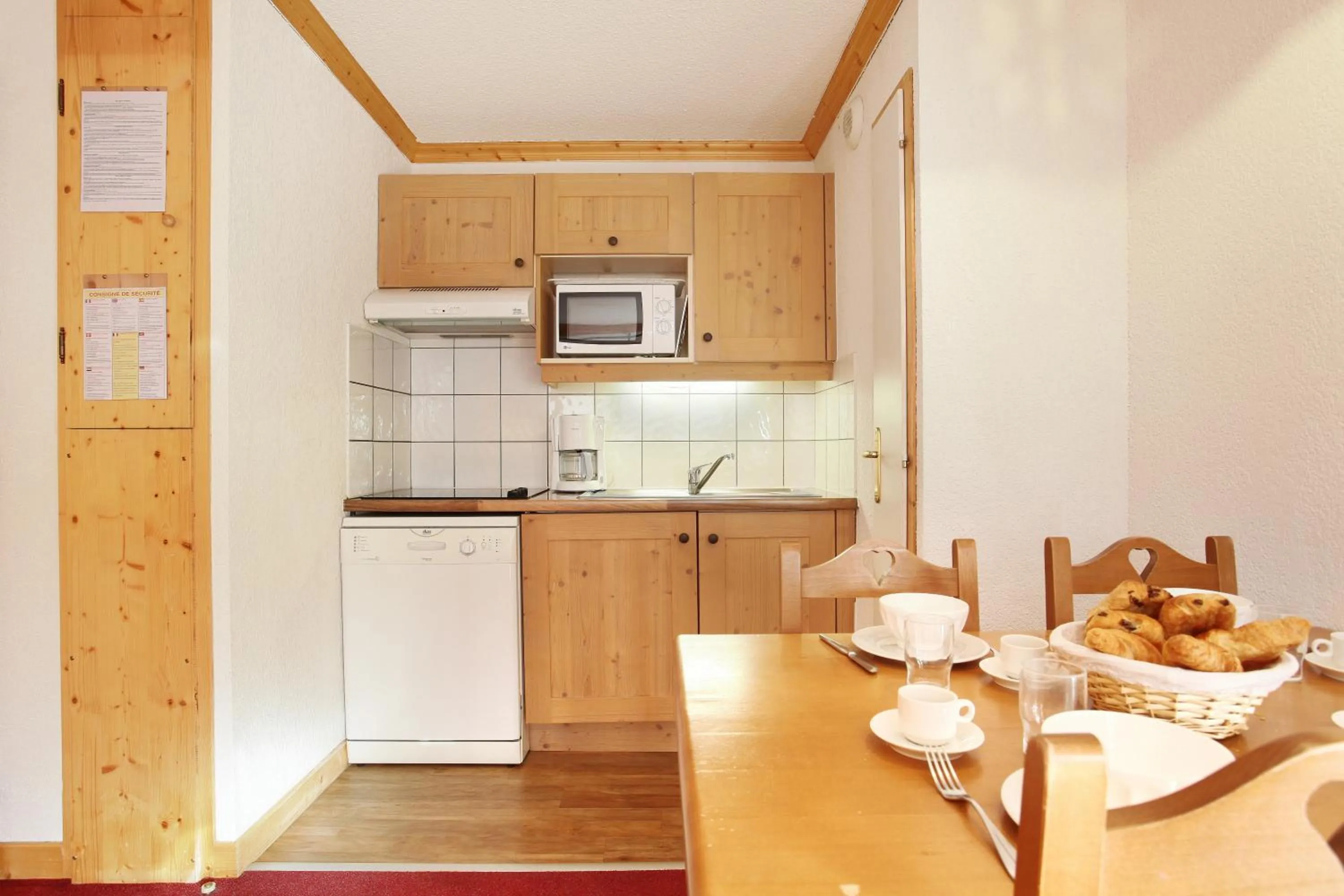 Kitchen or kitchenette in Résidence Odalys Le Village