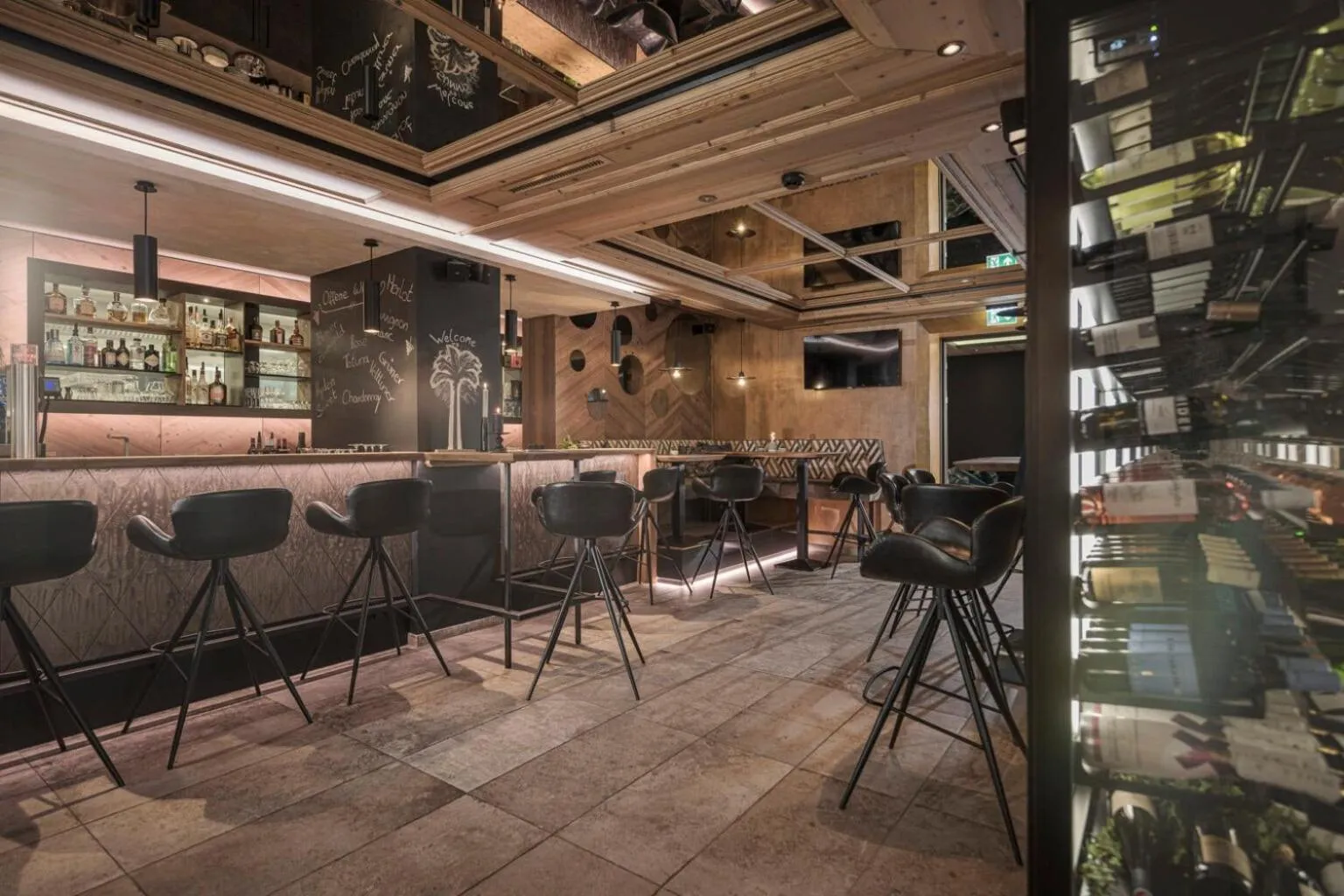 Lounge or bar in SonnenHOF hotel gerlos centrum