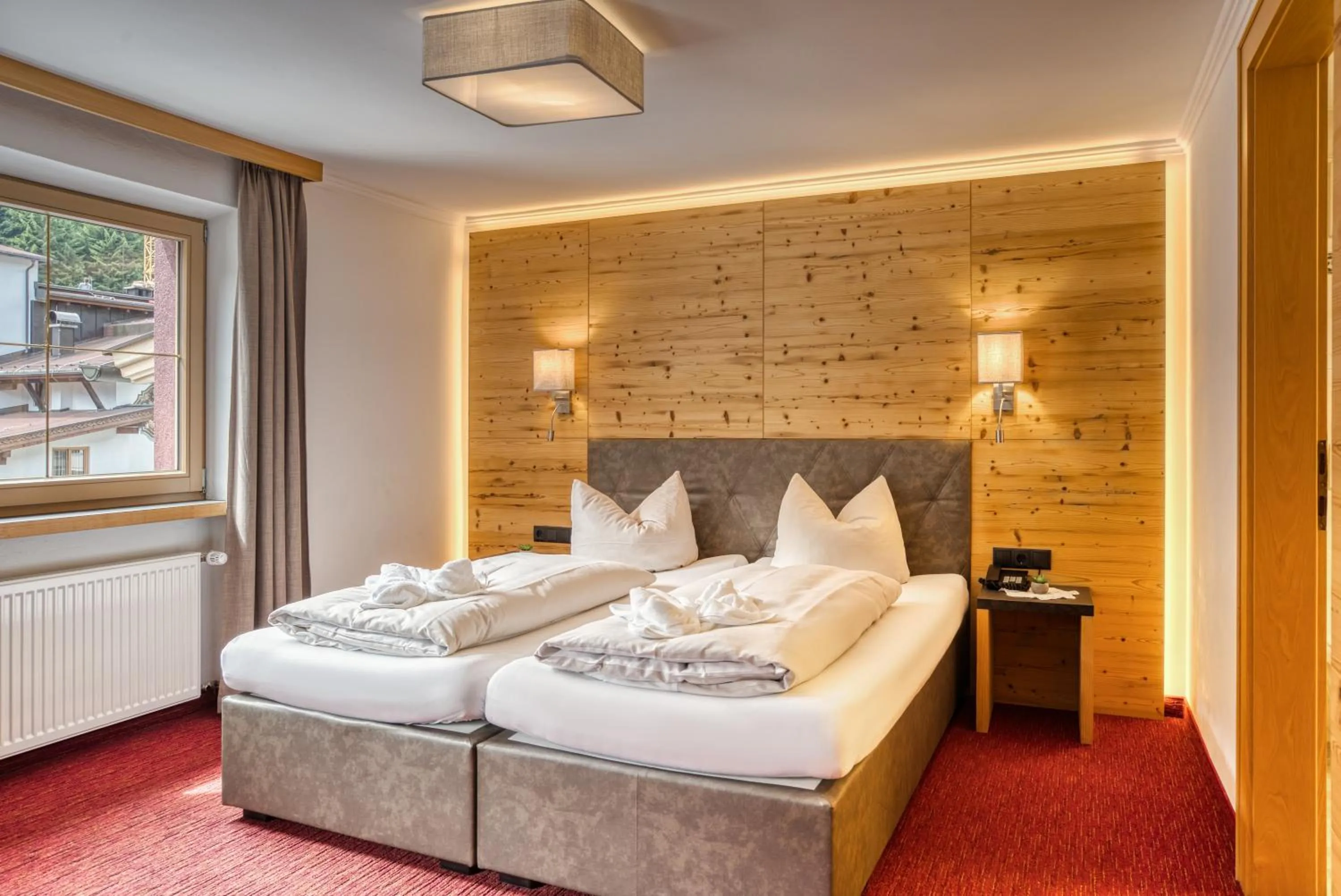 Bed in SonnenHOF hotel gerlos centrum