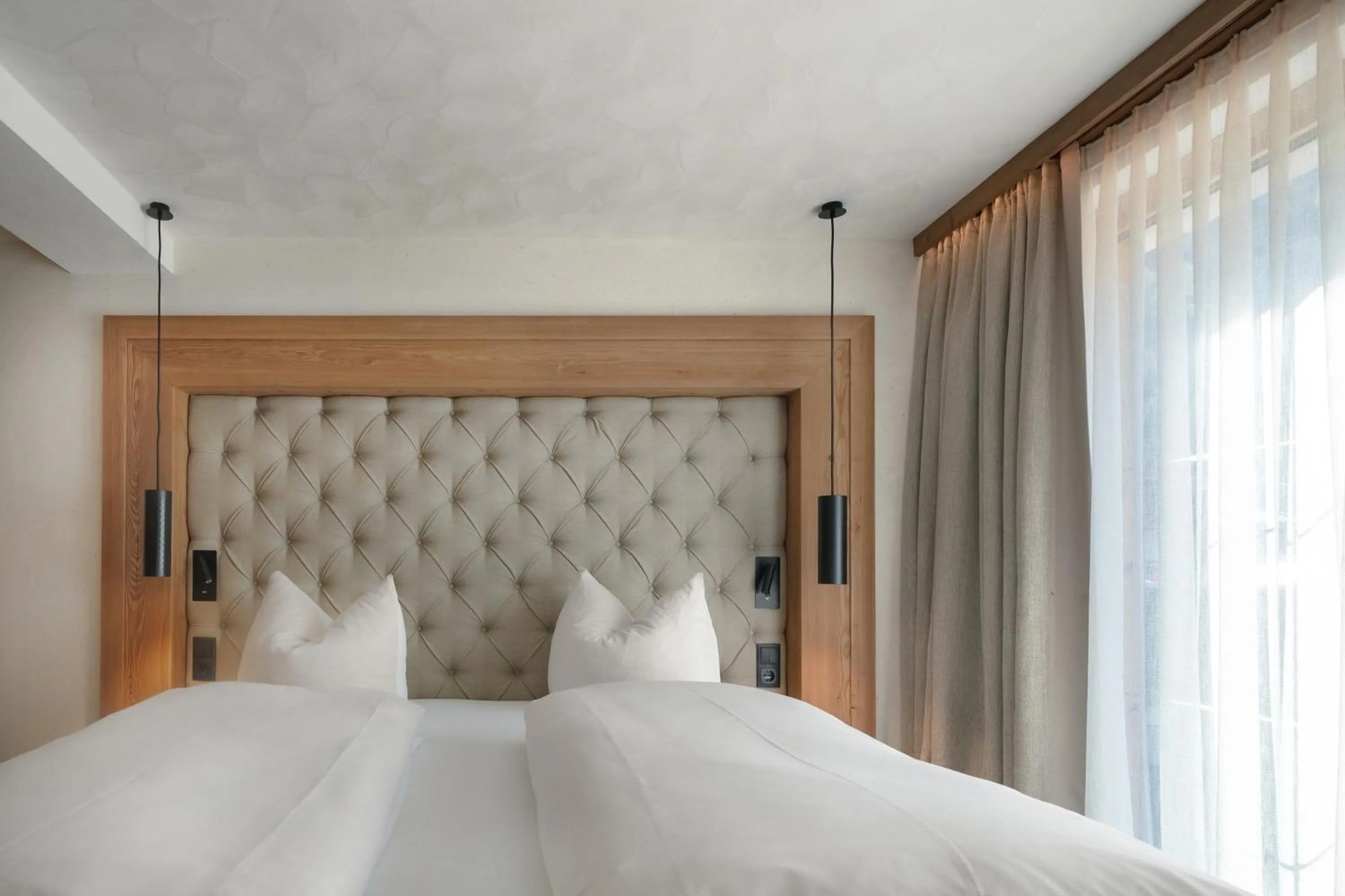 Photo of the whole room, Bed in SonnenHOF hotel gerlos centrum