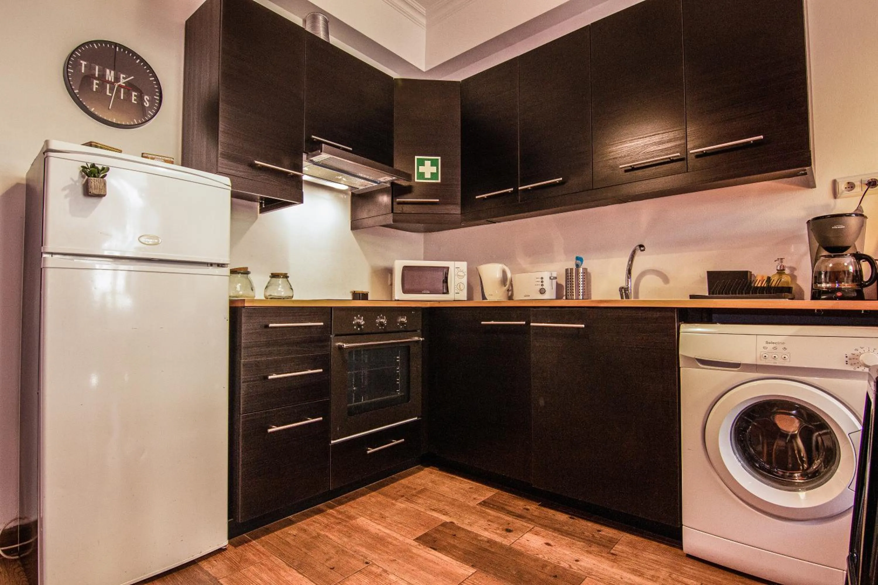 Kitchen or kitchenette in Faro Central - Holiday Apartments