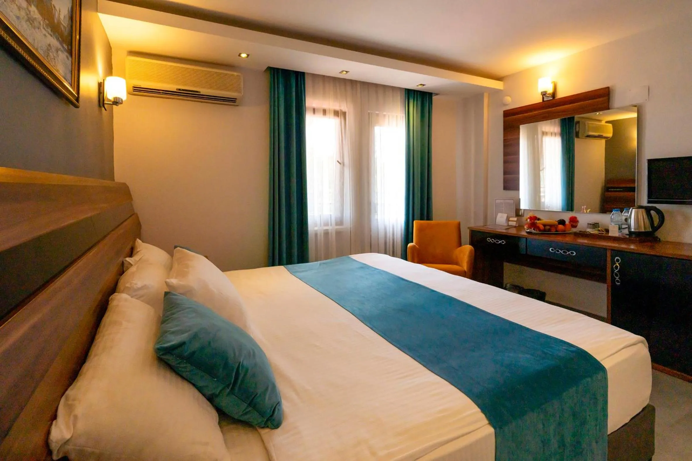 Bed in SIGNATURE GARDEN AVANOS Hotel & SPA