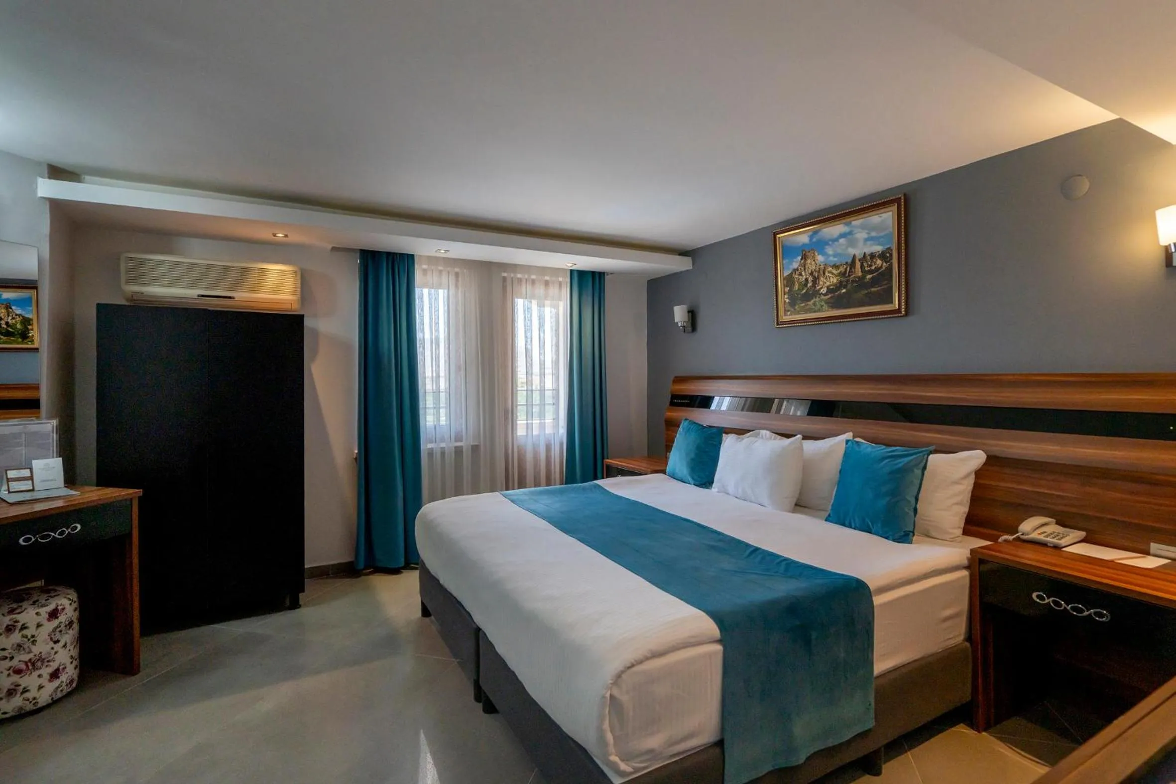 Bed in SIGNATURE GARDEN AVANOS Hotel & SPA