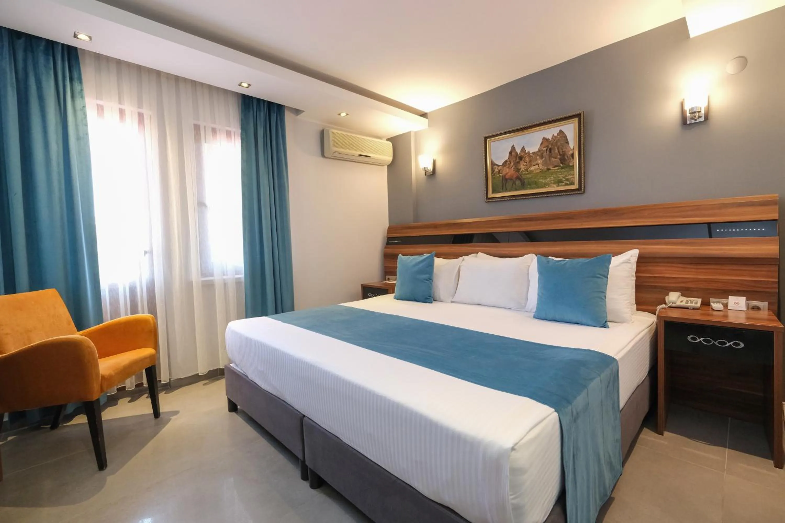 Bed in SIGNATURE GARDEN AVANOS Hotel & SPA