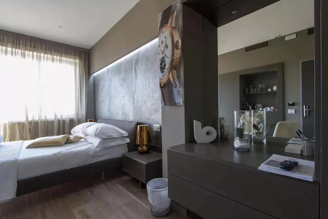 Bed in Ginevra Rooms