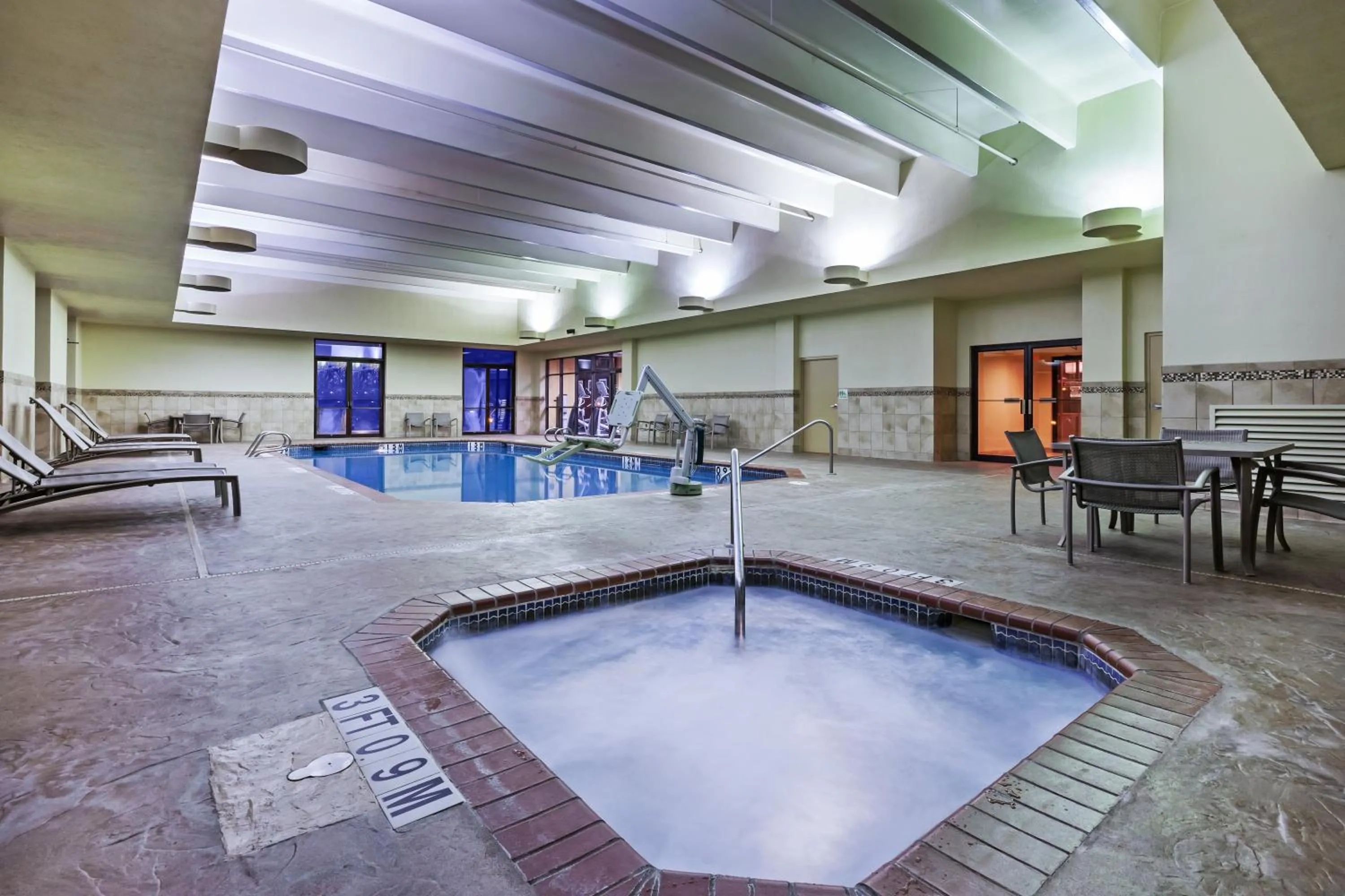 Swimming pool in Holiday Inn Springdale-Fayetteville Area by IHG