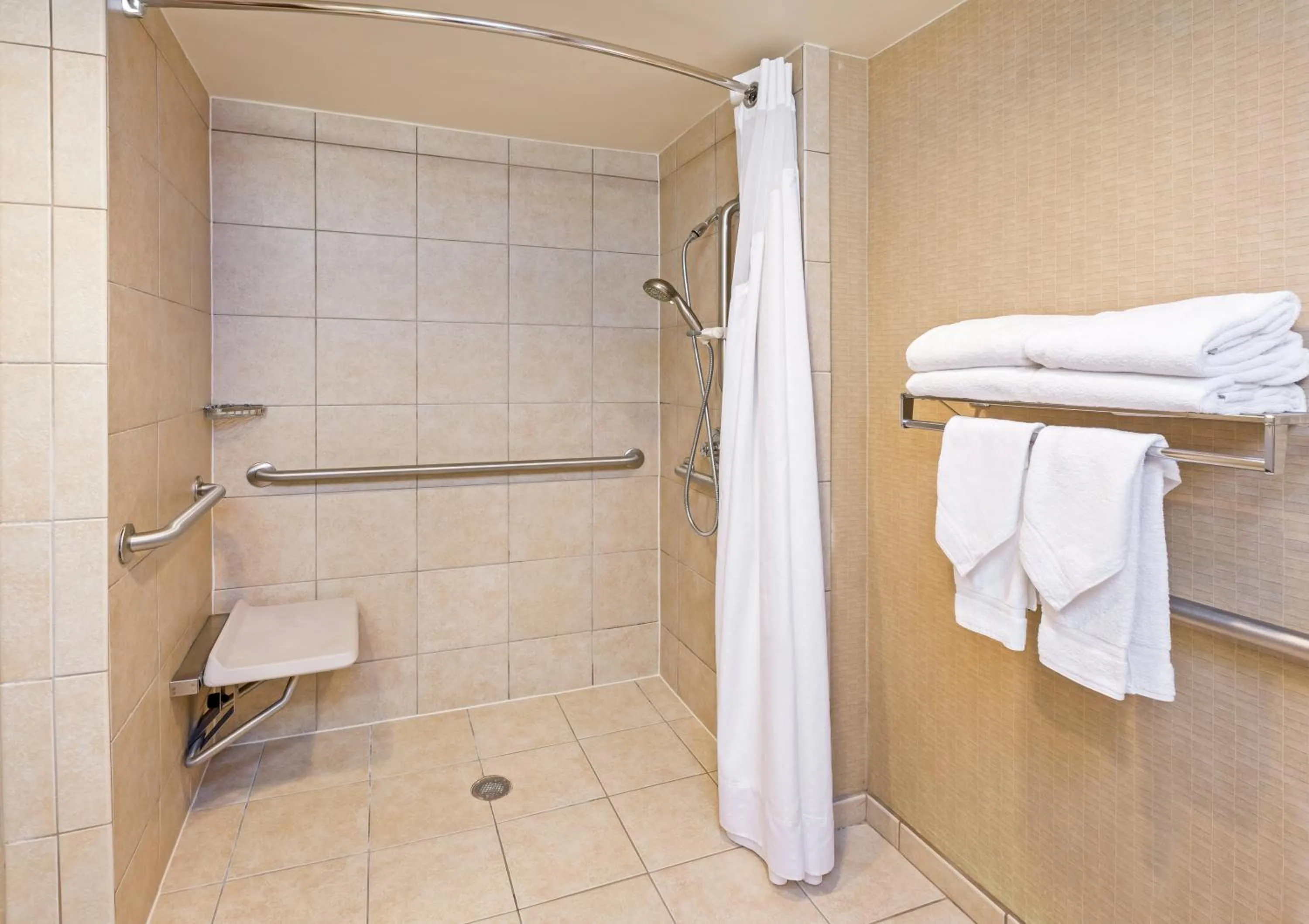 Bathroom in Holiday Inn Springdale-Fayetteville Area by IHG