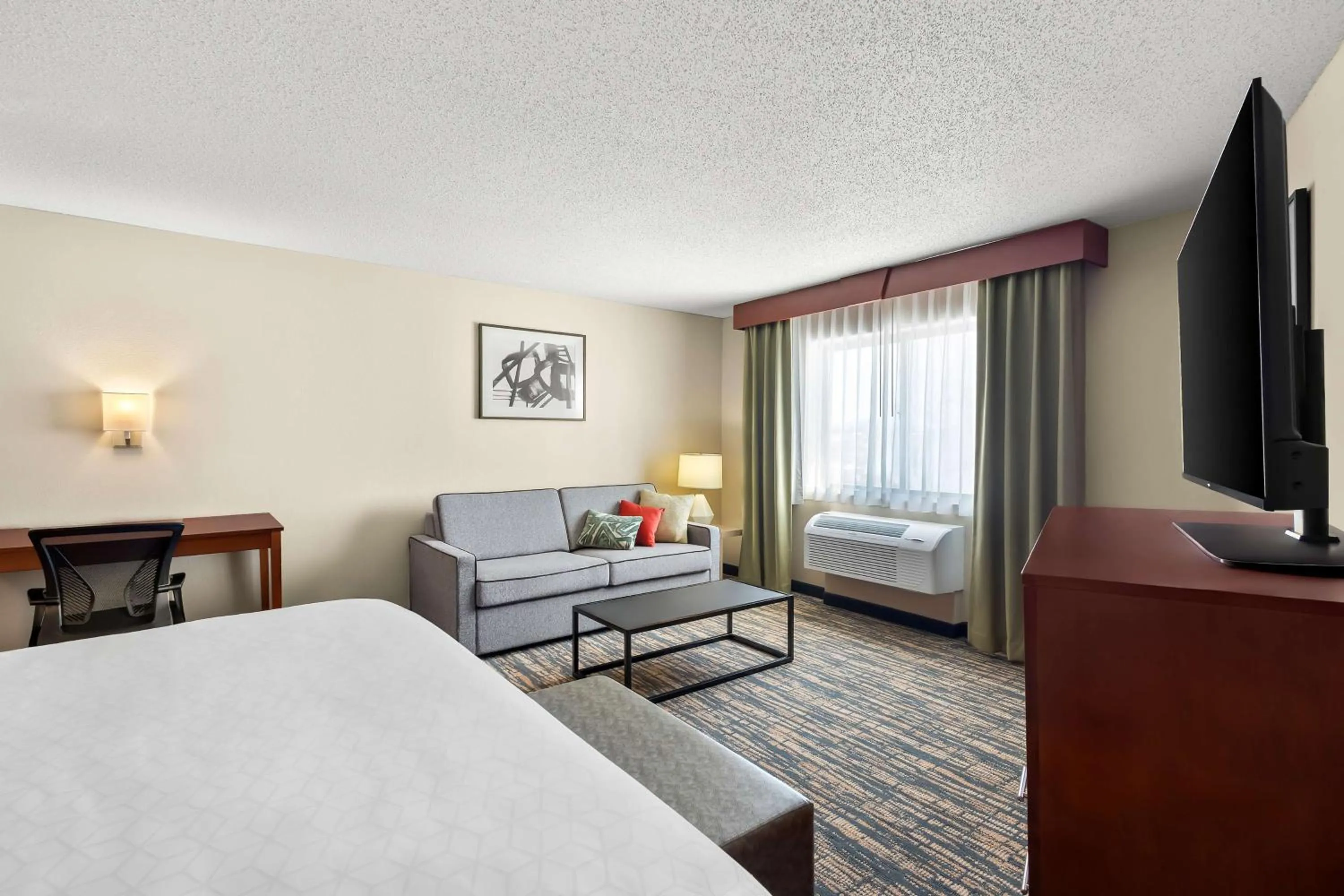 Photo of the whole room, Bed in SureStay Plus by Best Western Fremont I-69