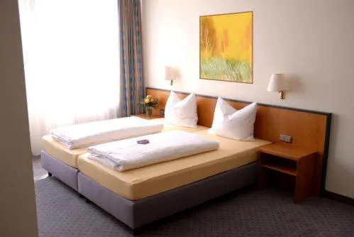 Bed in Hotel Leipziger Land