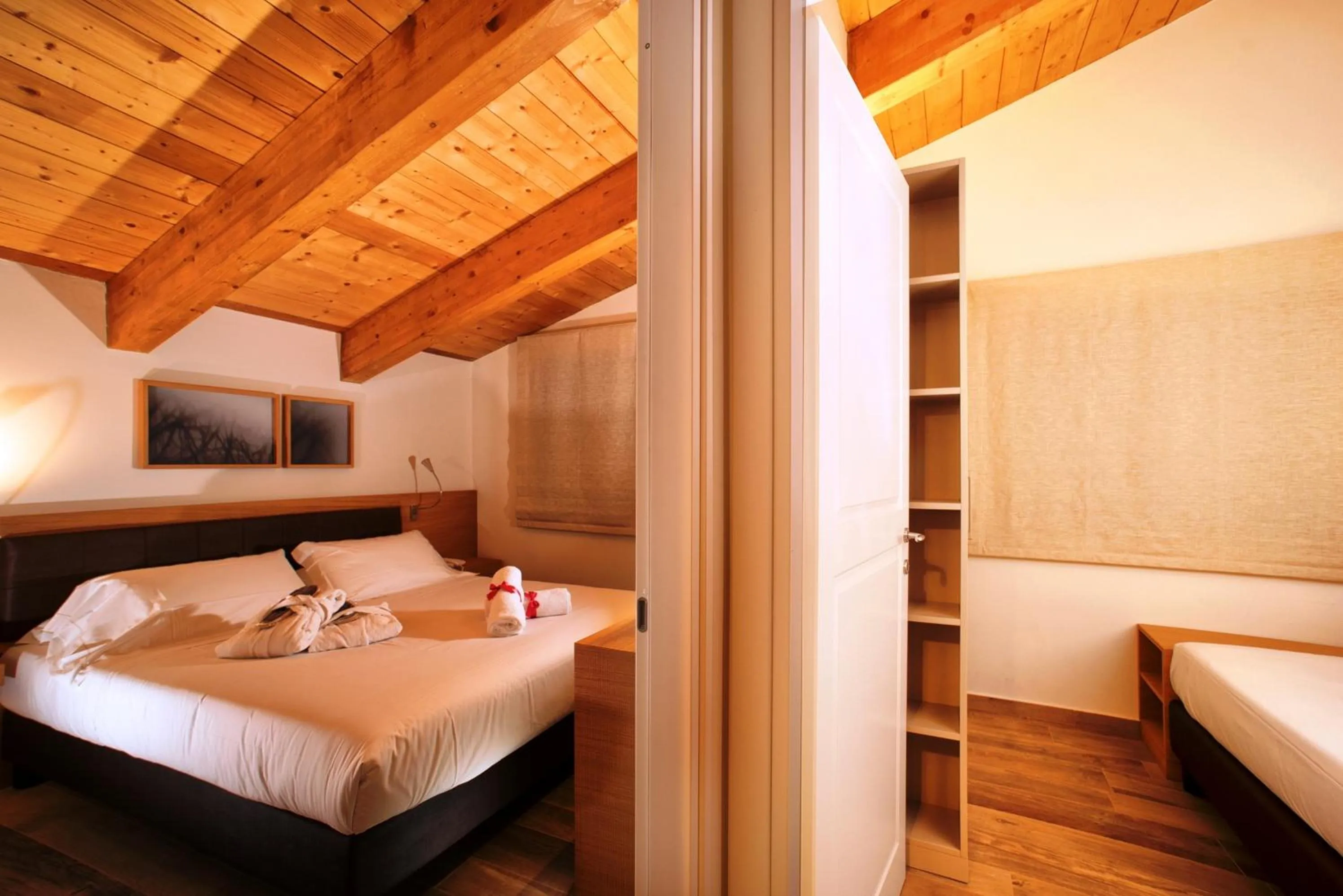 Bed in Guesia Village Hotel e Spa