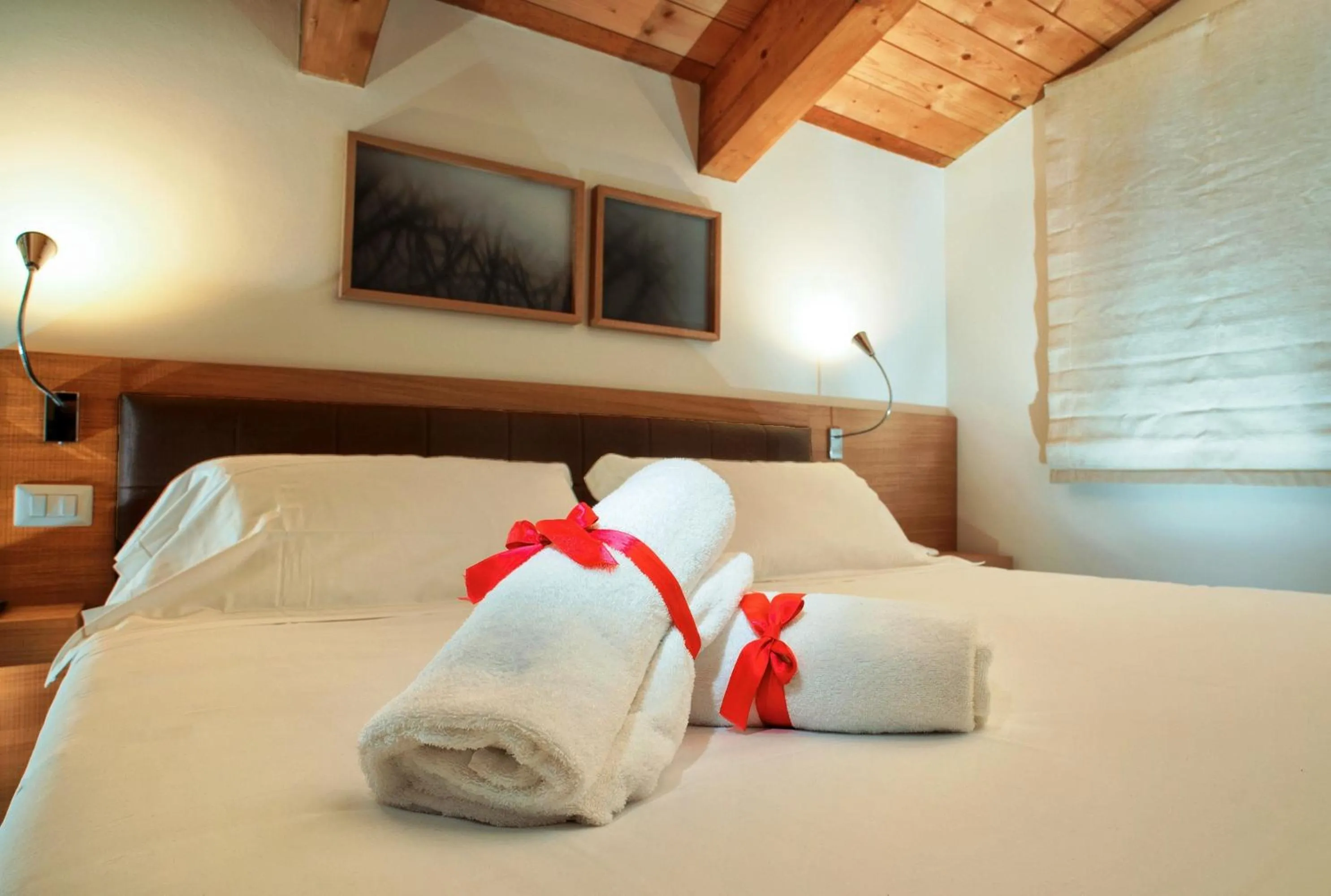 Bed in Guesia Village Hotel e Spa