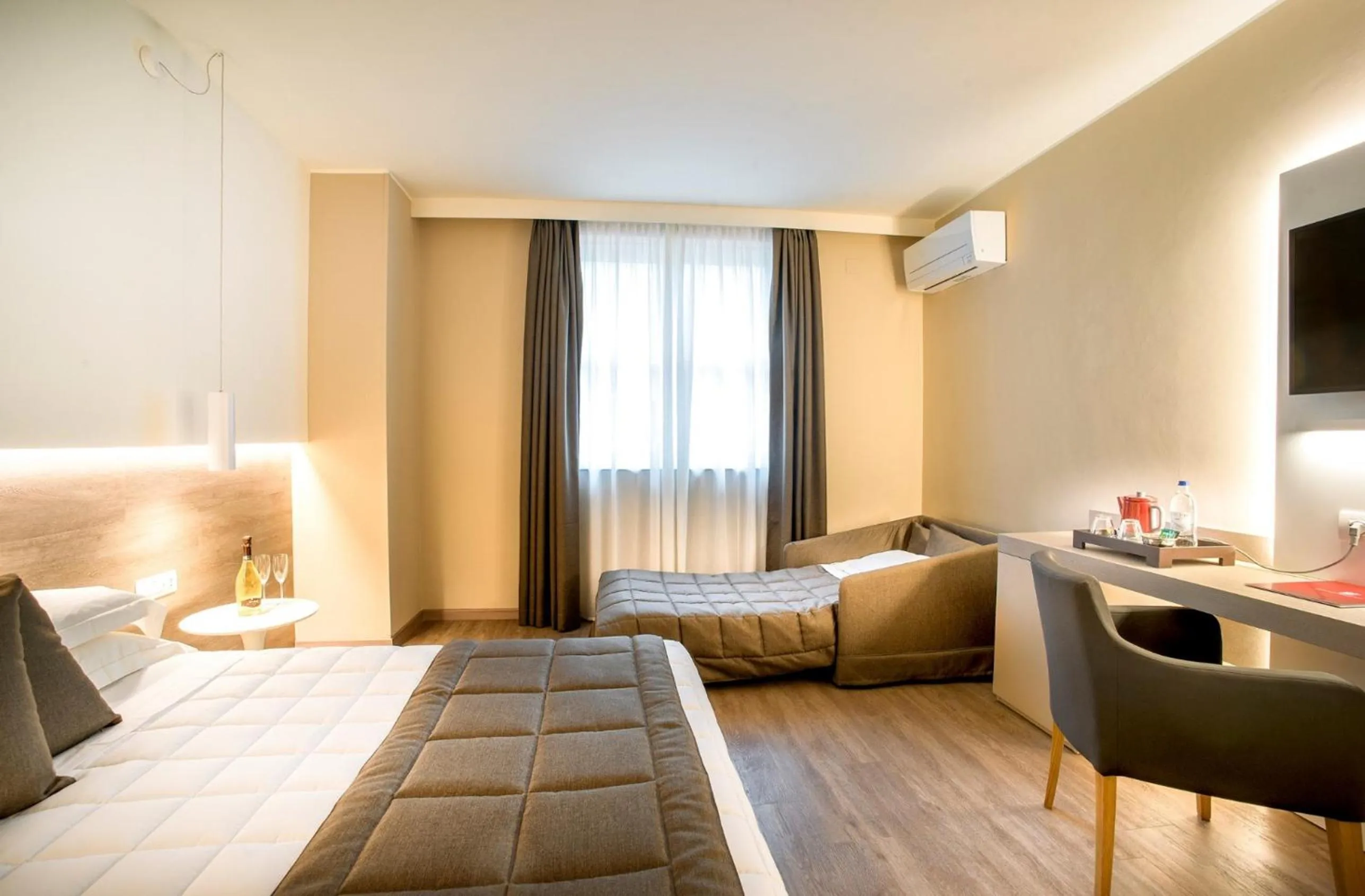 Bed in Guesia Village Hotel e Spa