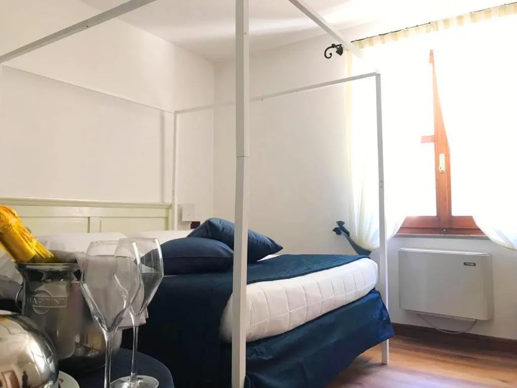 Bed in Guesia Village Hotel e Spa