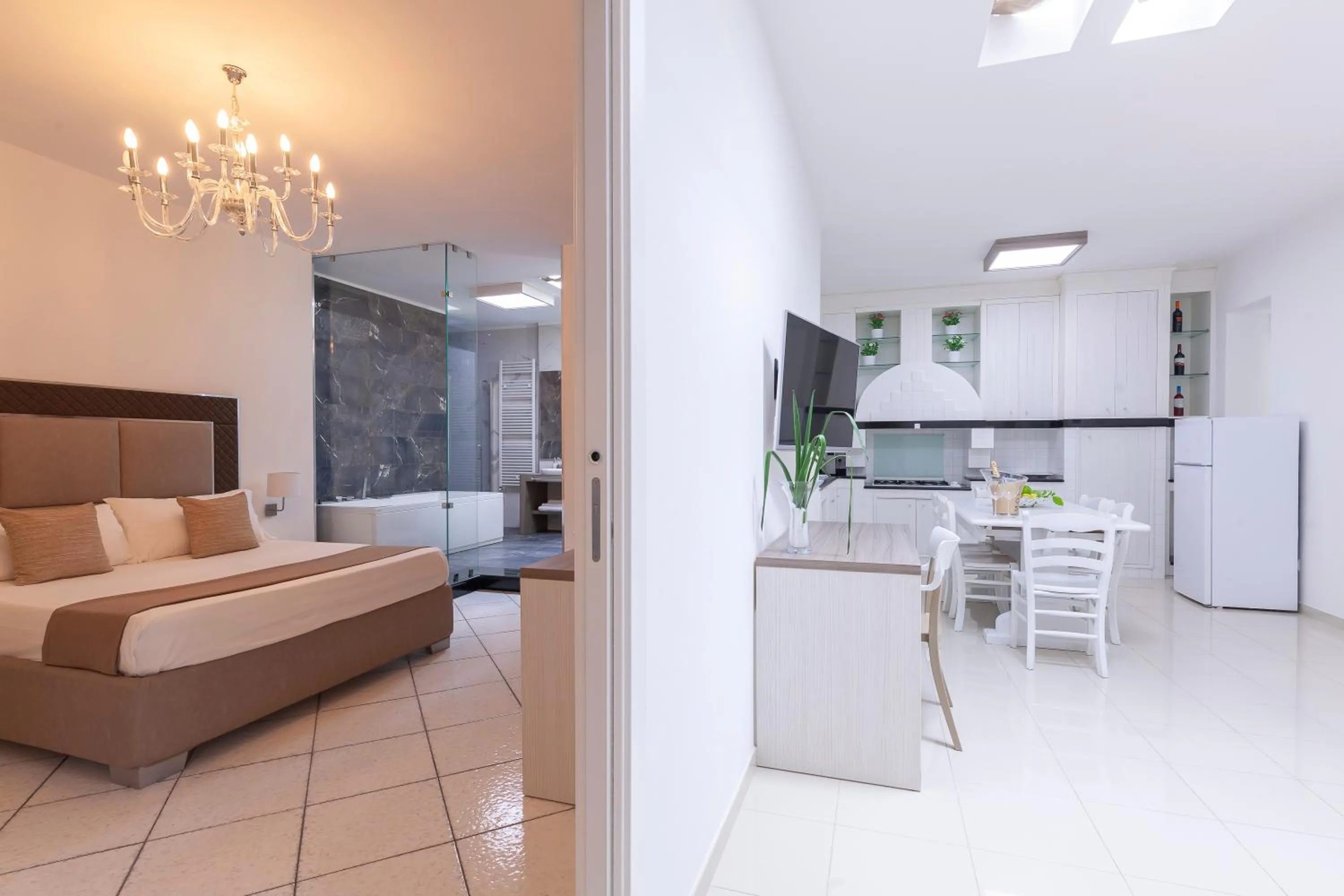 Kitchen or kitchenette, Bed in Relais Regina Rosanna