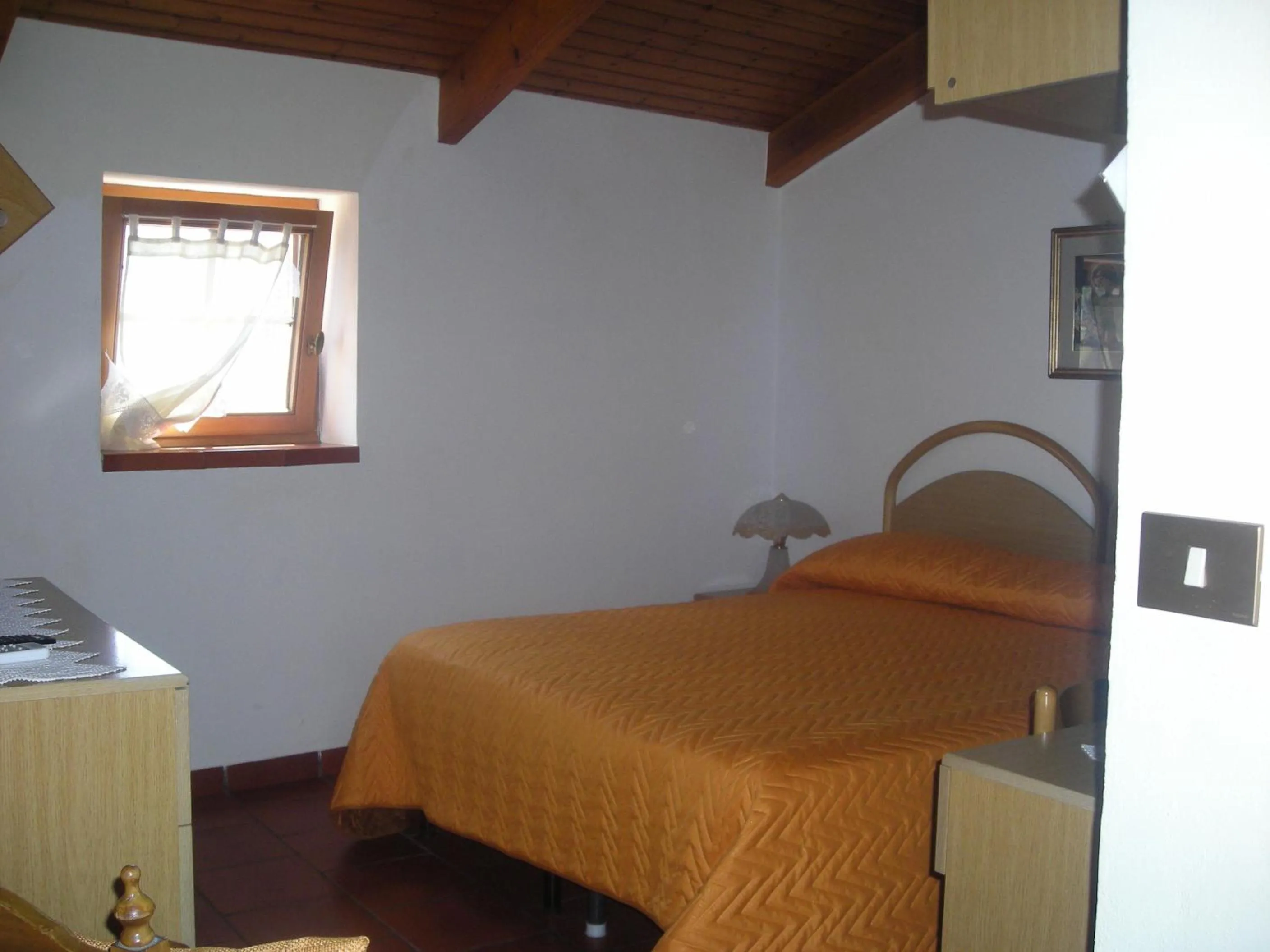Bed in B&B L'Arcobaleno