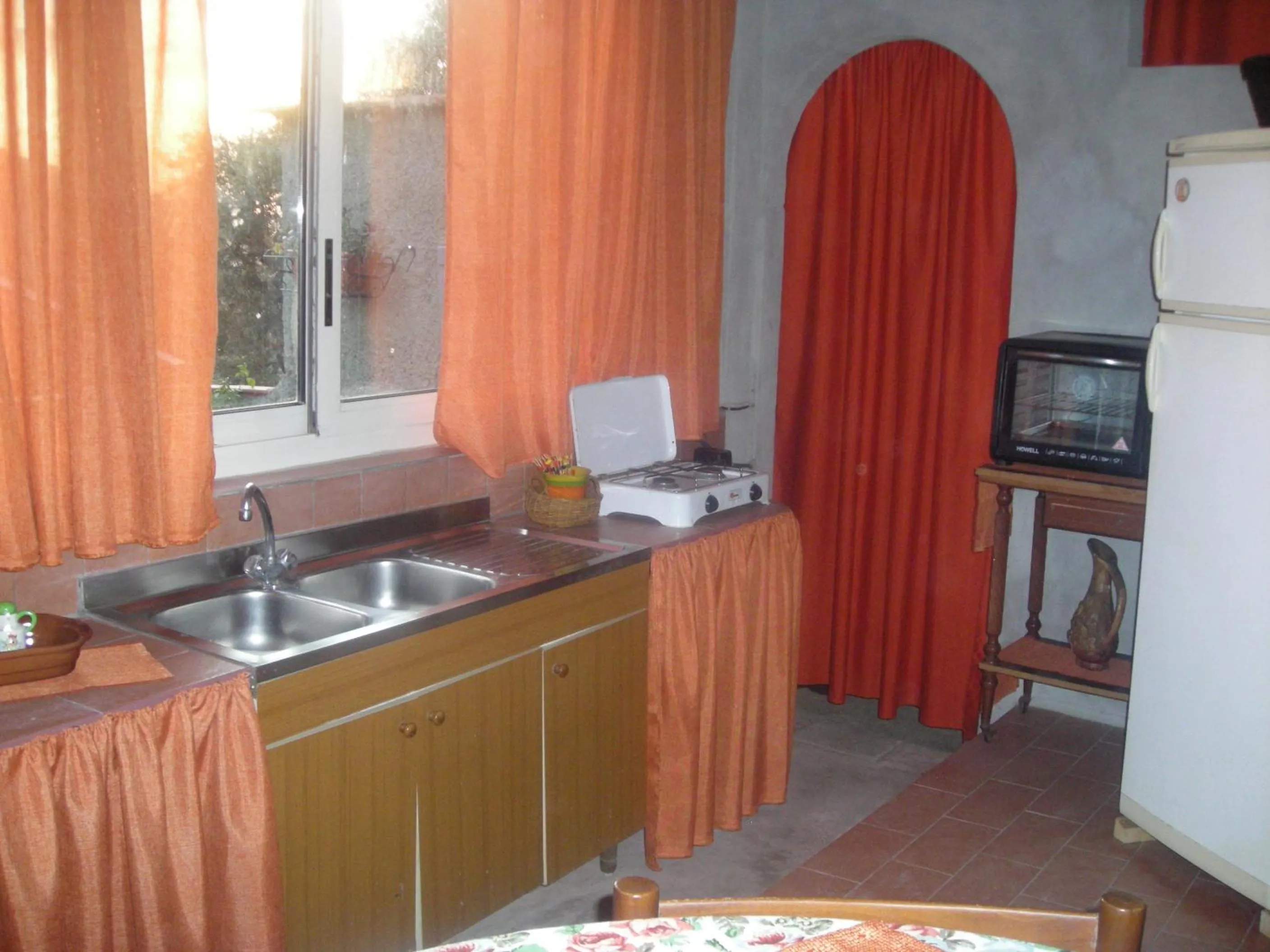 Communal lounge/ TV room in B&B L'Arcobaleno