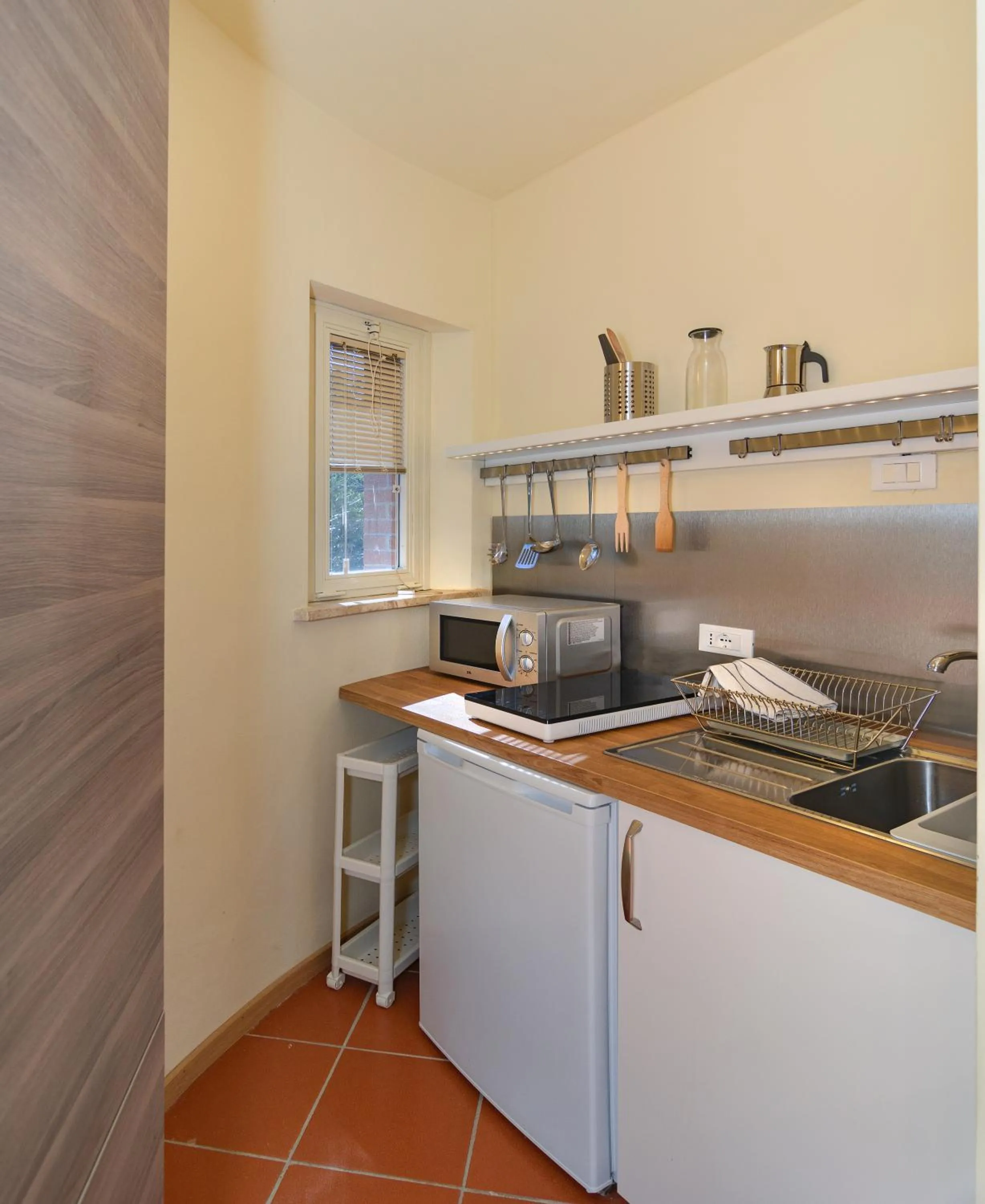 Kitchen or kitchenette in Residence San Rossore