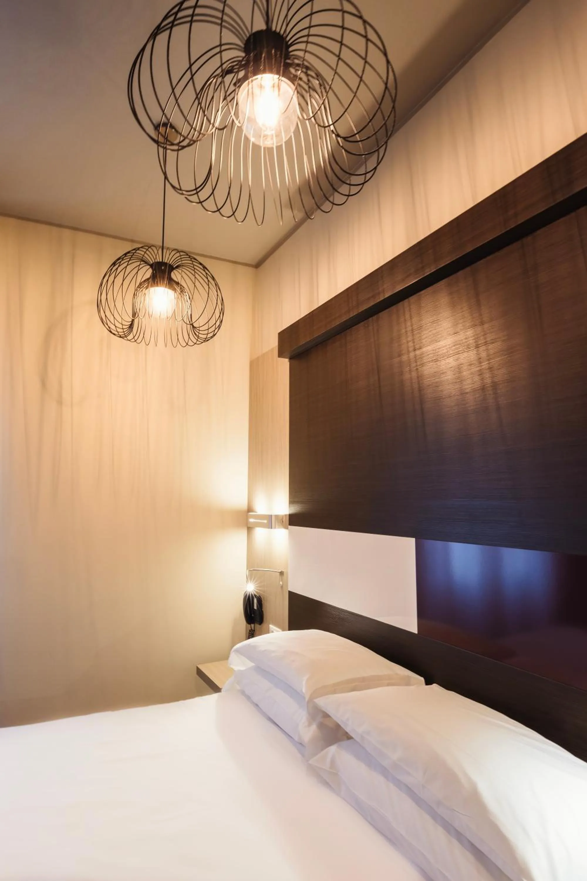 Bedroom, Bed in Genius Hotel Downtown