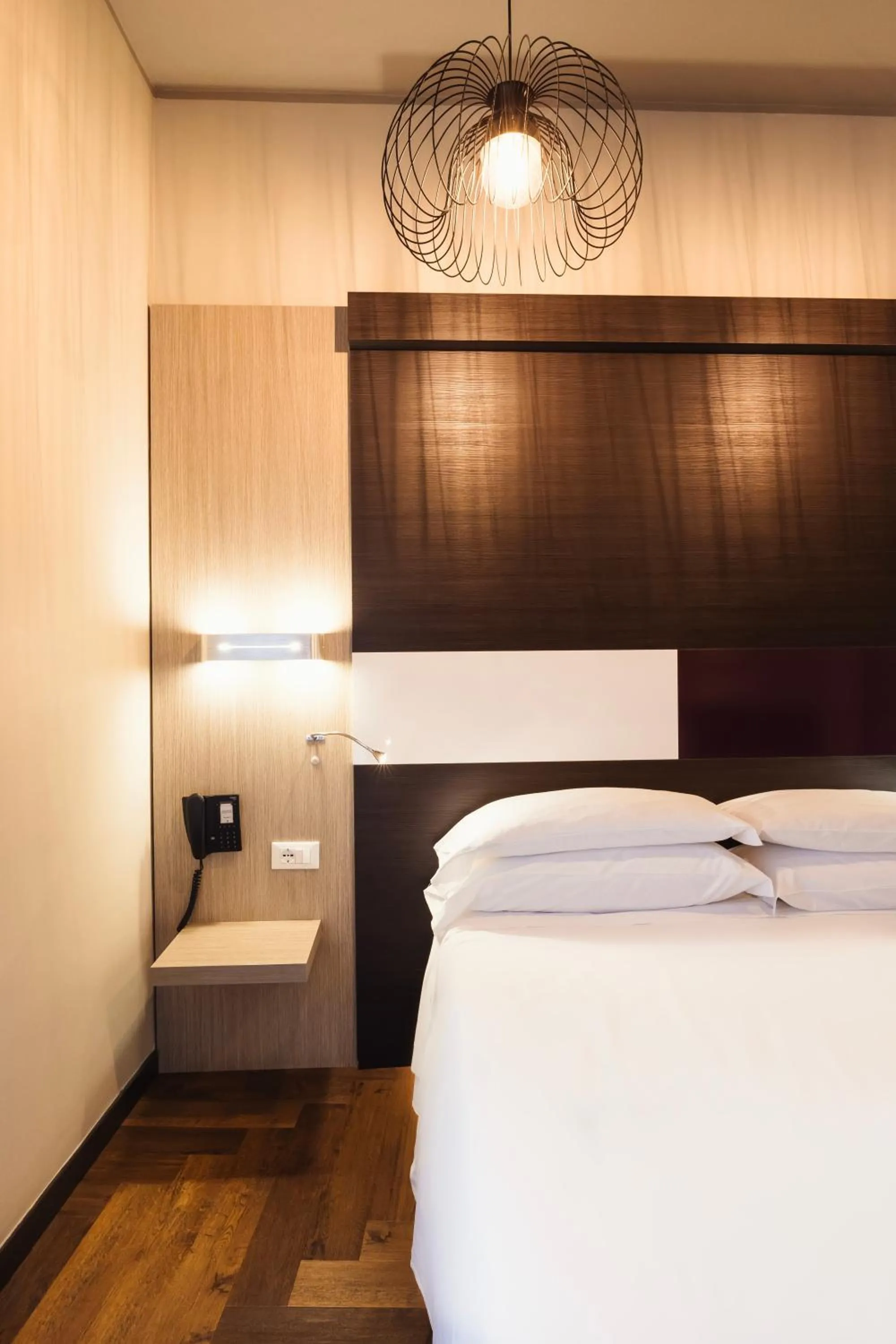 Bed in Genius Hotel Downtown