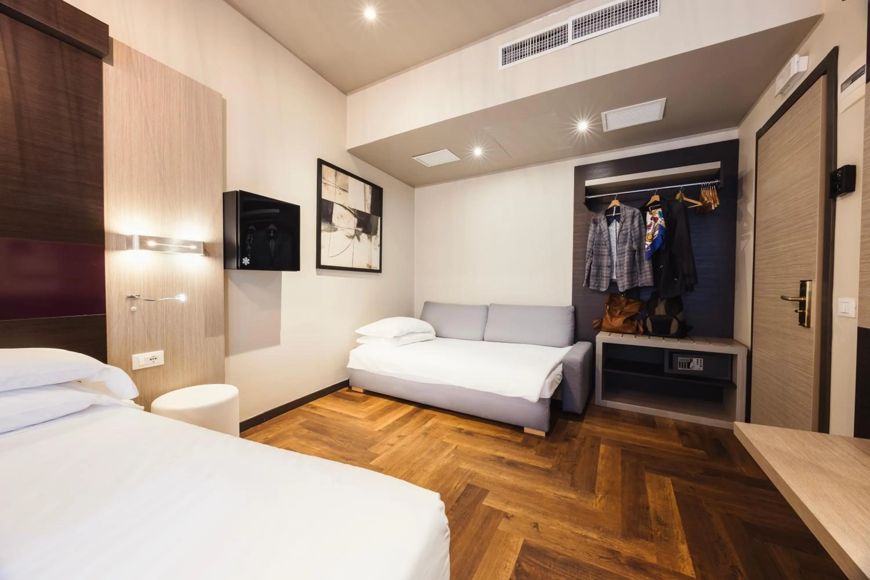 Bed in Genius Hotel Downtown