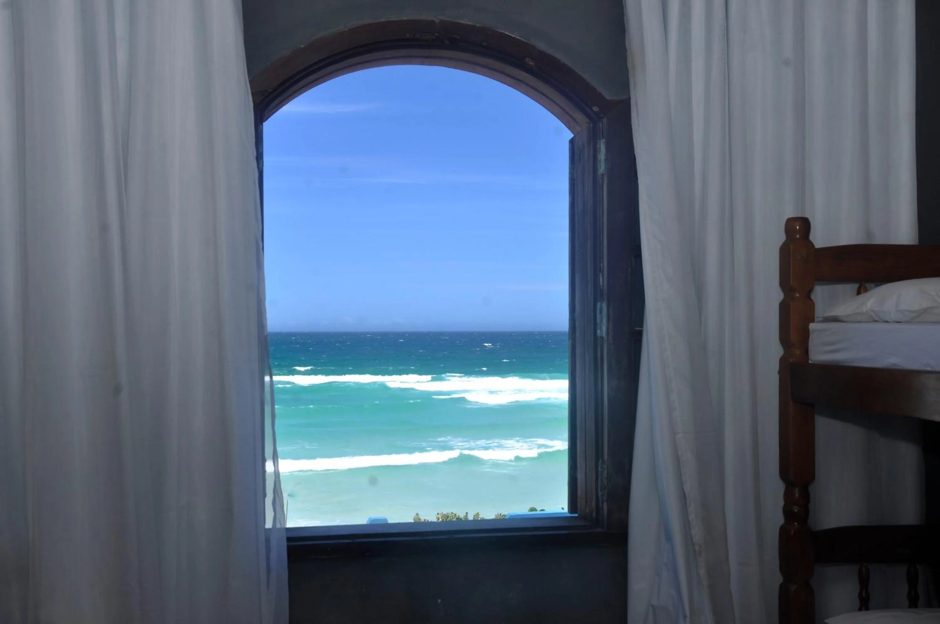 Bed in Pousada My House Cabo Frio