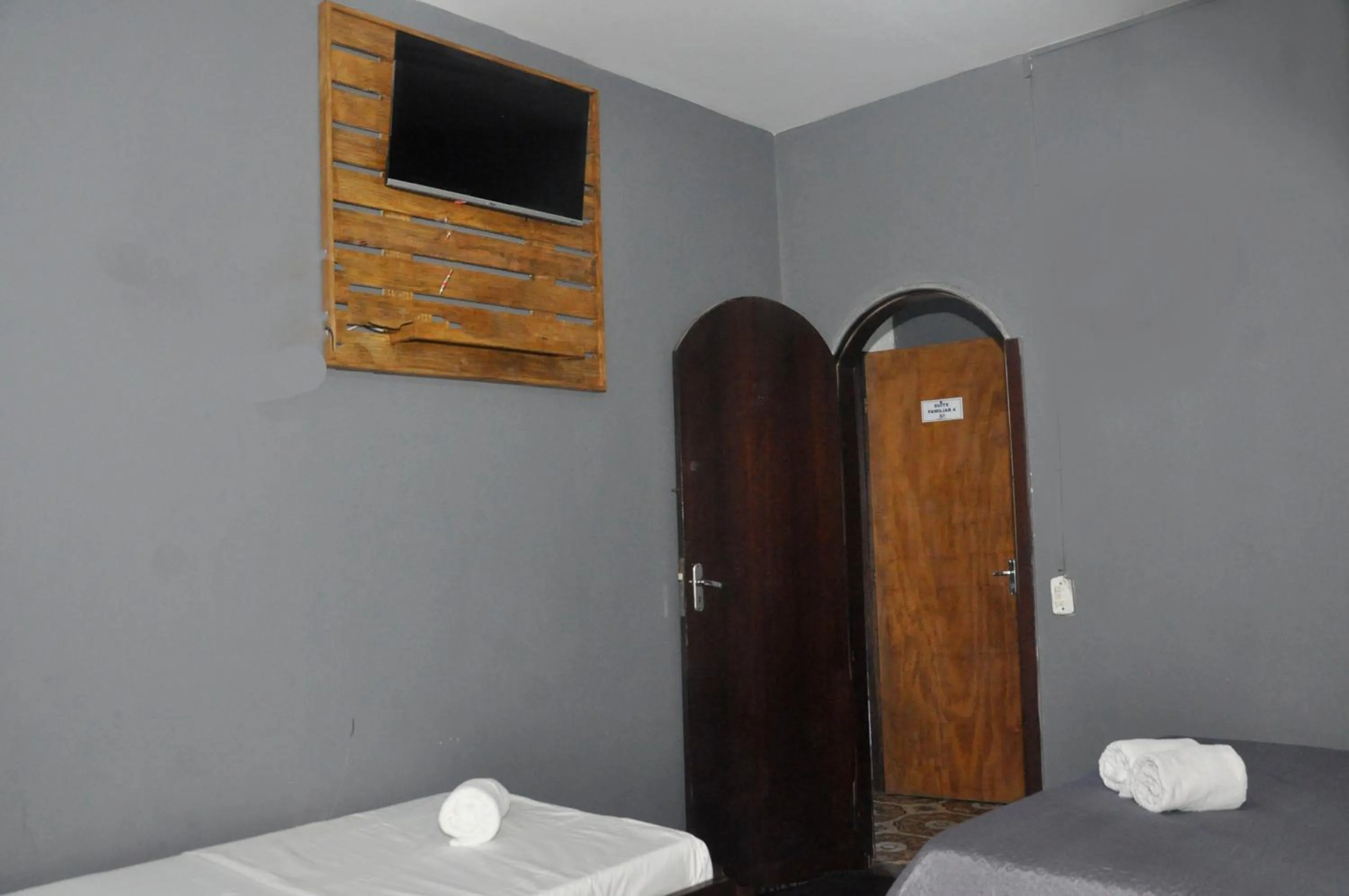 Bed in Pousada My House Cabo Frio