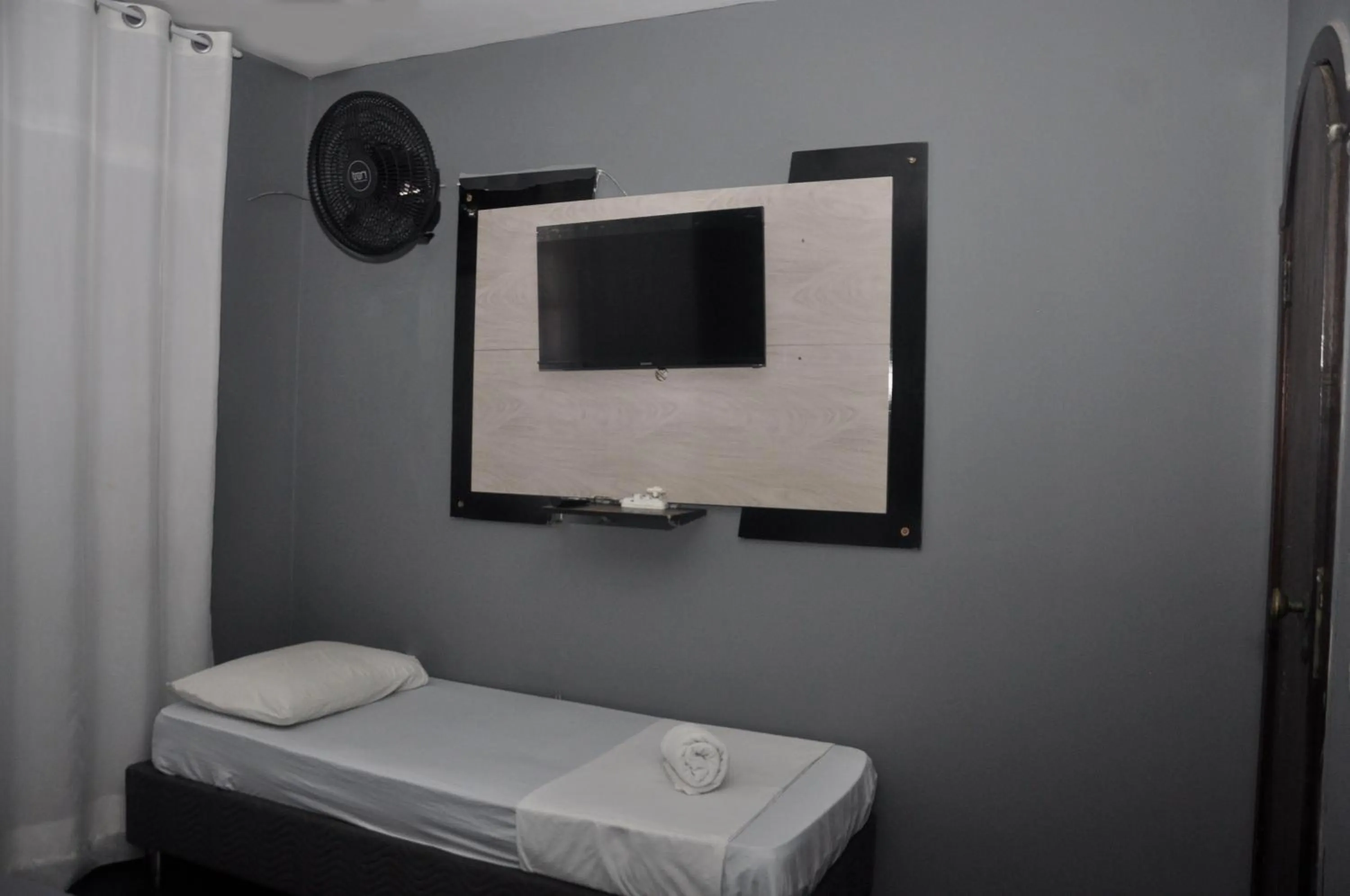 Bed in Pousada My House Cabo Frio