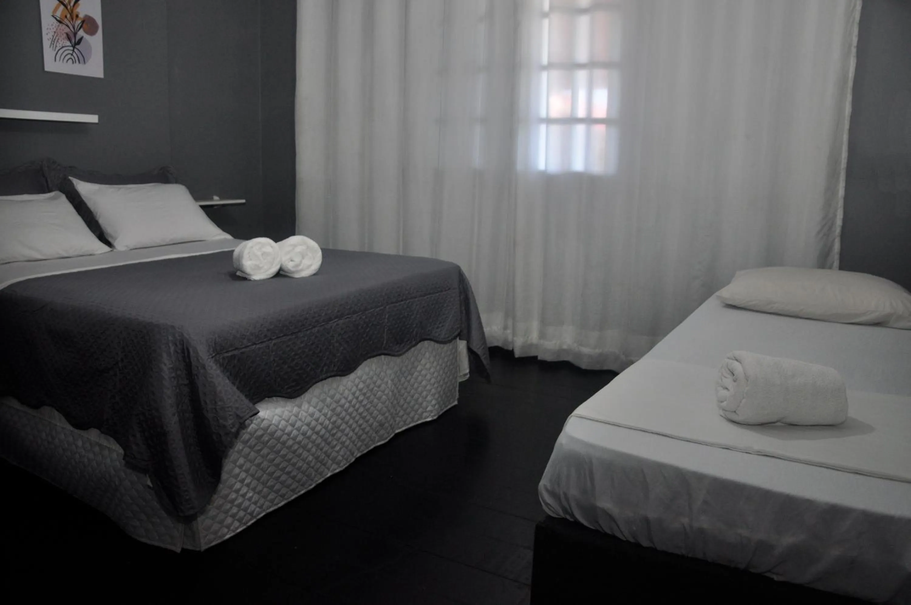 Bed in Pousada My House Cabo Frio