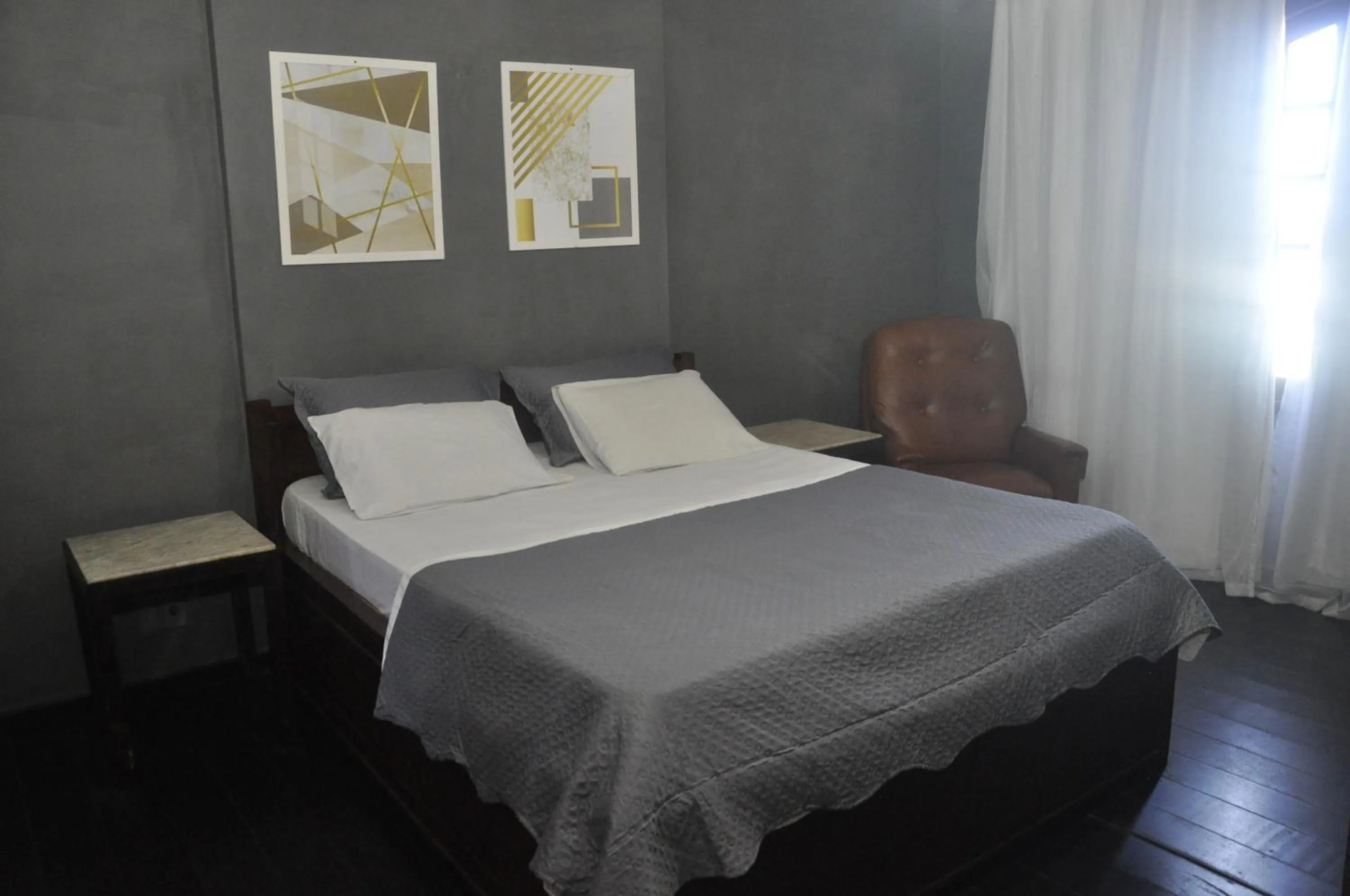 Bed in Pousada My House Cabo Frio