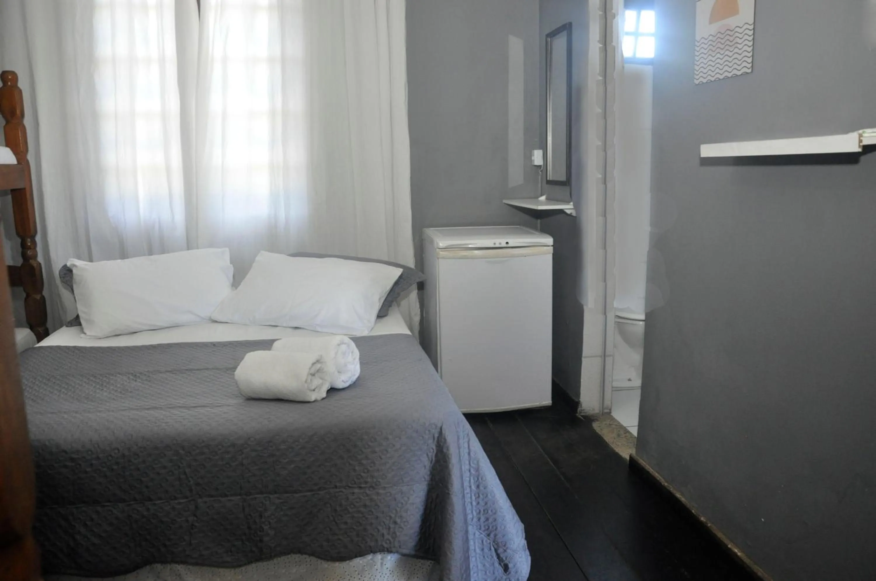 Bed in Pousada My House Cabo Frio