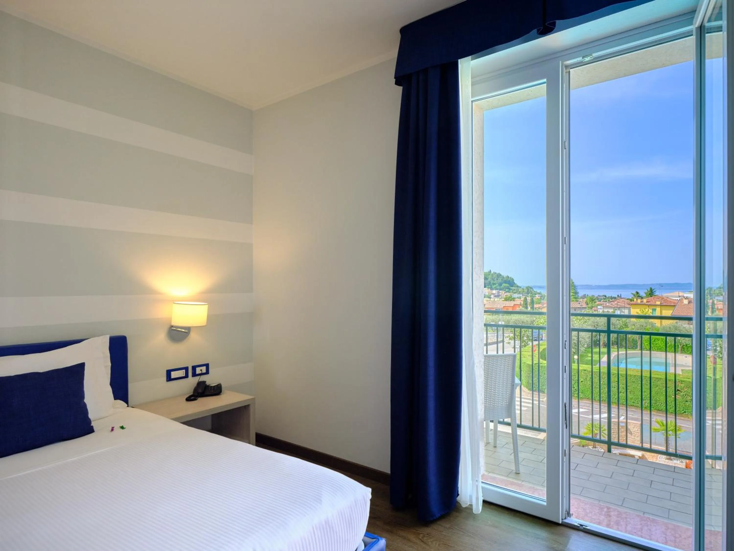 View (from property/room), Bed in Hotel Eden Garda