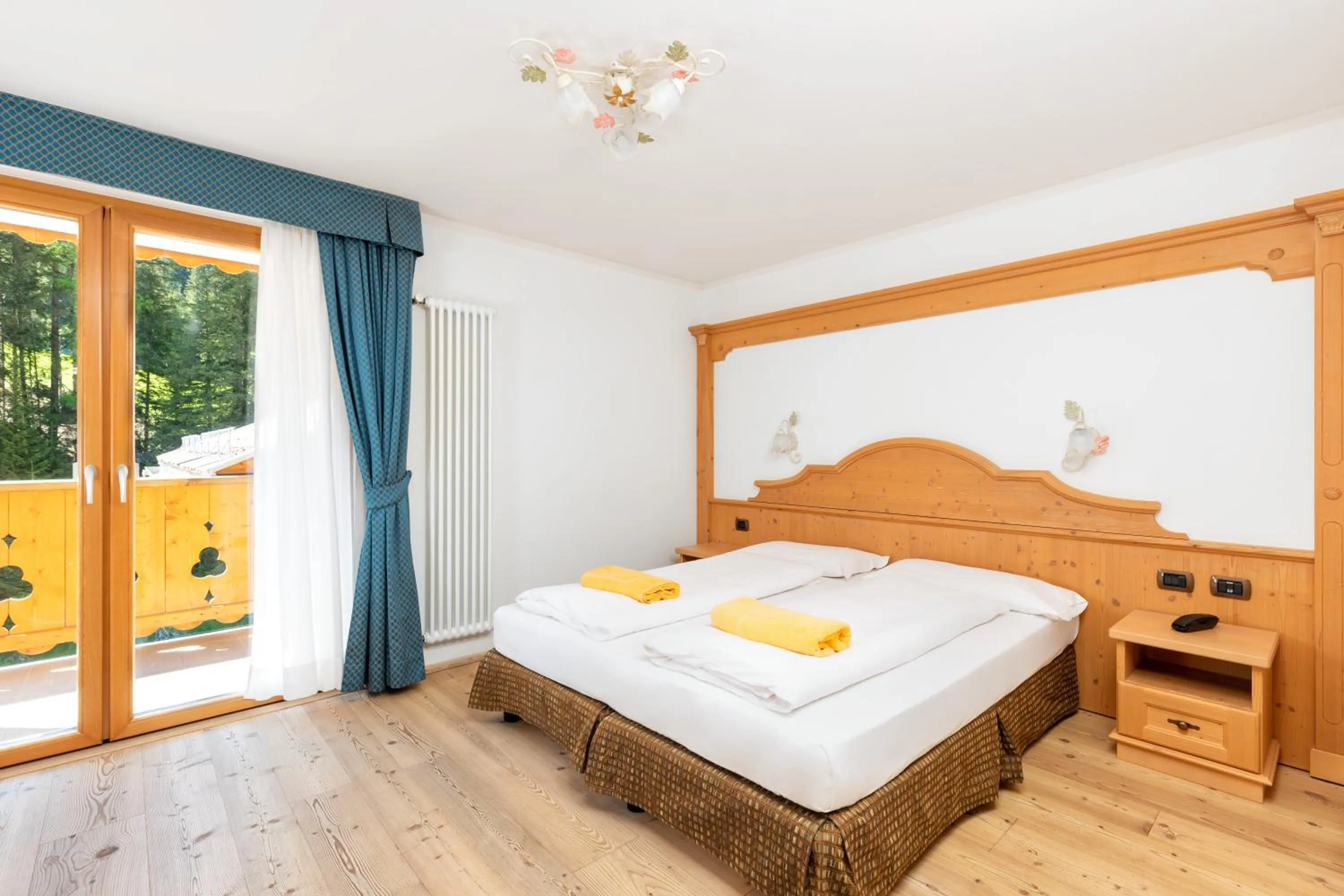 Bedroom, Bed in Wellness Hotel Lupo Bianco